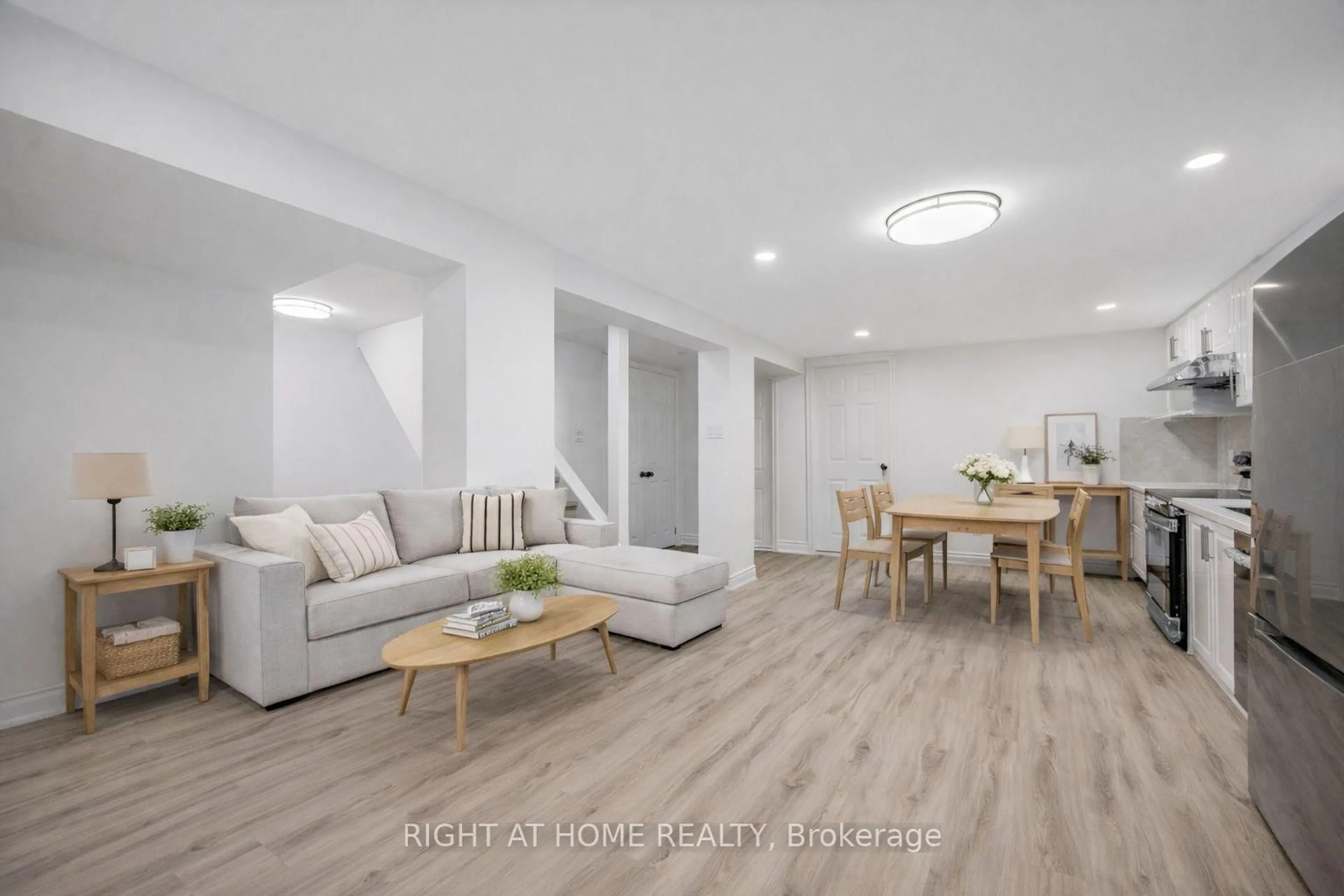 Living room with furniture, wood/laminate floor for 225 Essex Ave, Richmond Hill Ontario L4C 2C1