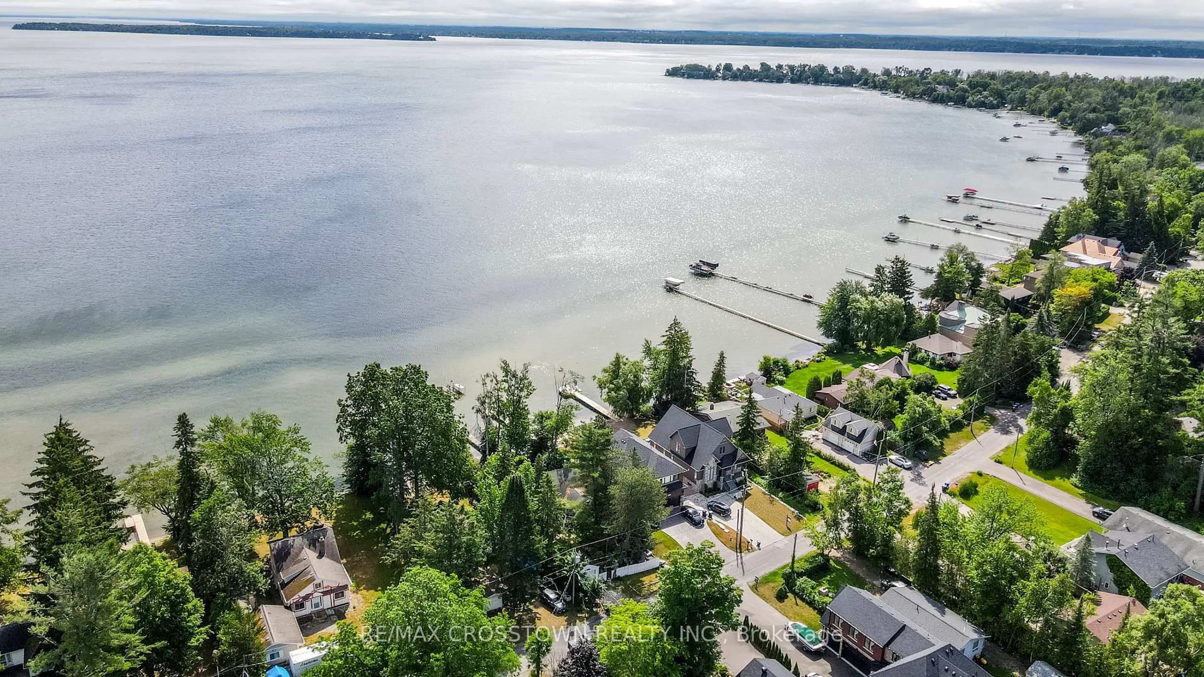 A pic from outside/outdoor area/front of a property/back of a property/a pic from drone, water/lake/river/ocean view for 1895 Simcoe Blvd, Innisfil Ontario L9S 4N3
