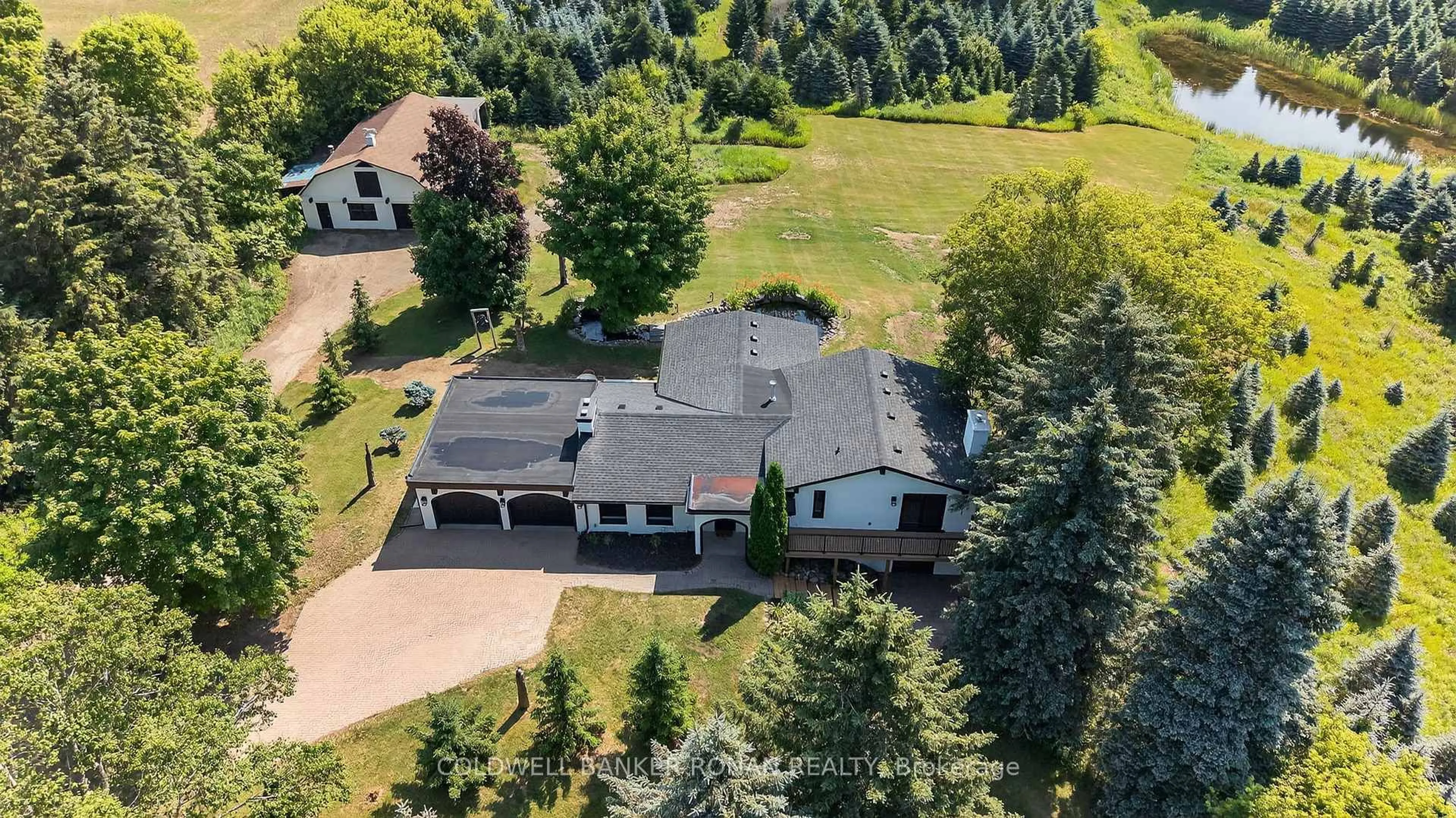 A pic from outside/outdoor area/front of a property/back of a property/a pic from drone, mountain view for 993177 Mono Adjala Townline, Adjala-Tosorontio Ontario L9W 2Z2