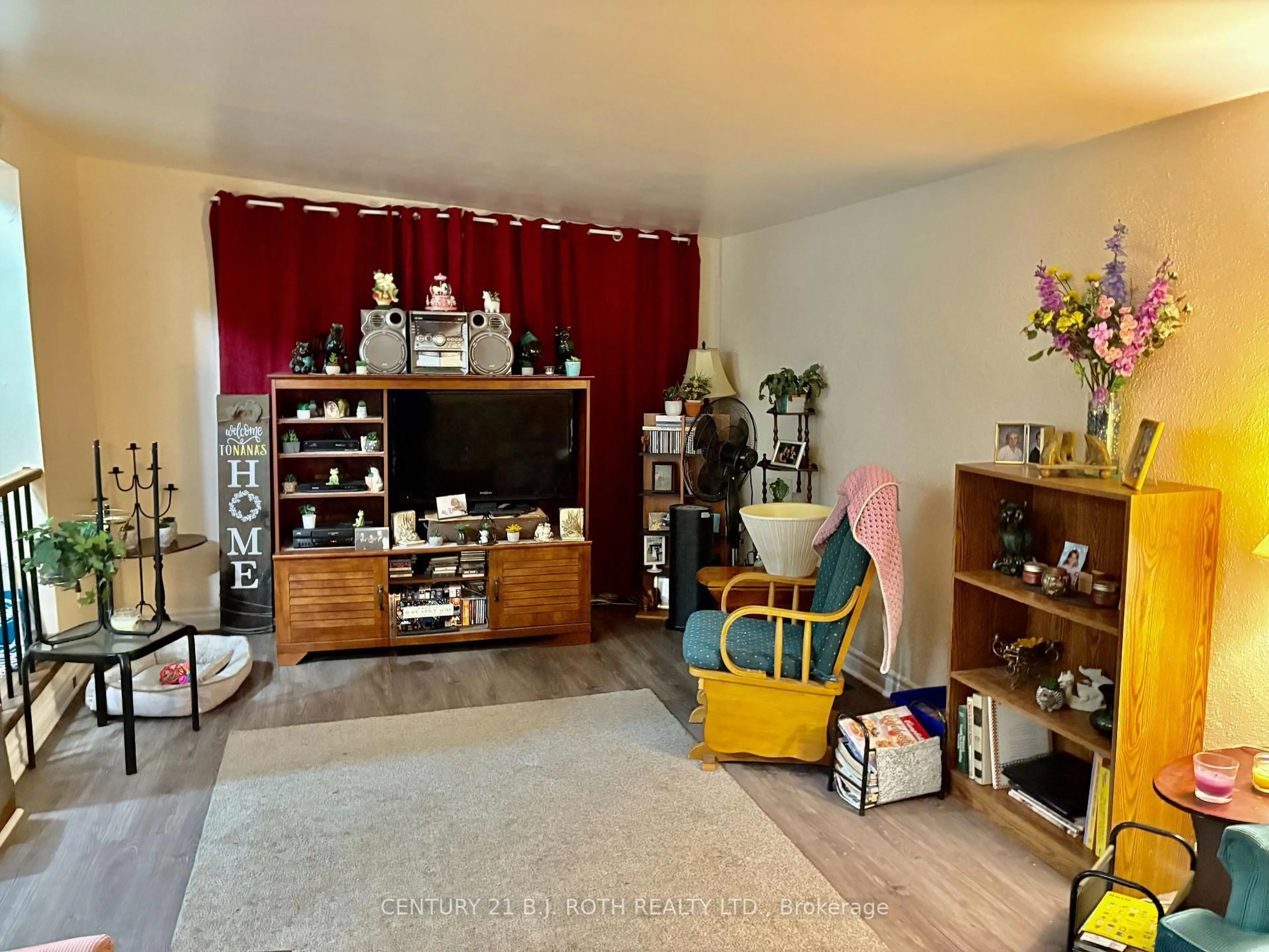 Living room with furniture, unknown for 20 Shamrock Cres, Essa Ontario L3W 0T7