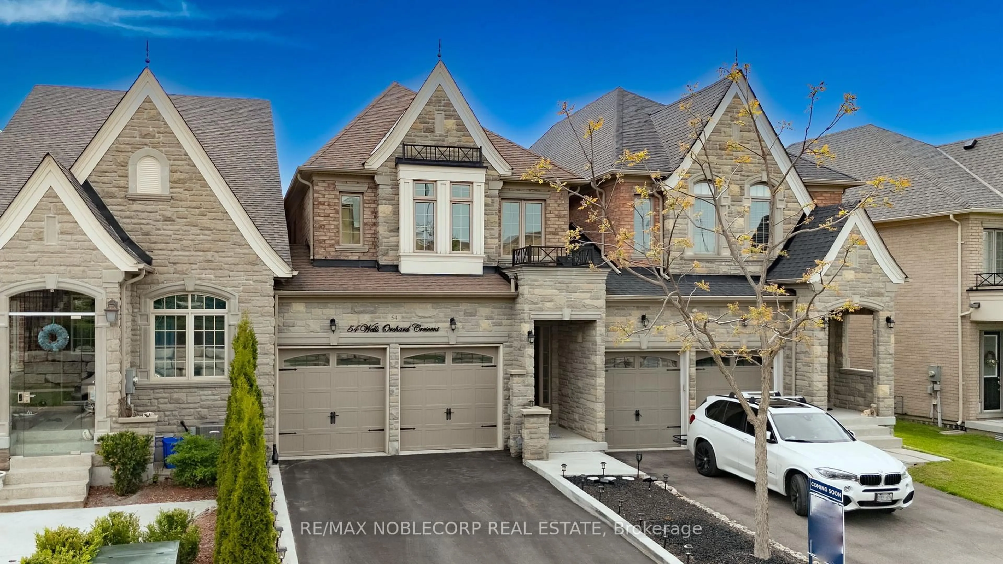 Home with brick exterior material, street for 54 Wells Orchard Cres, King Ontario L7B 0C6