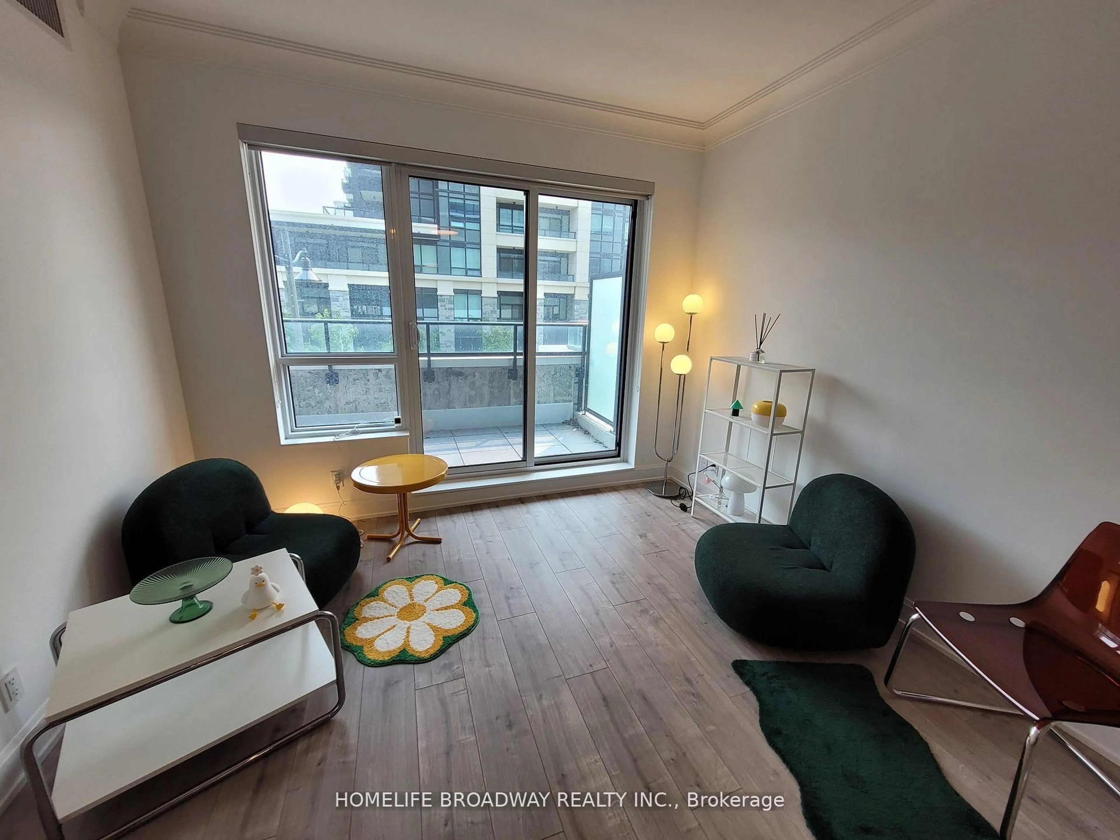 Living room with furniture, wood/laminate floor for 18 Water Walk Dr #201, Markham Ontario L3R 6L5