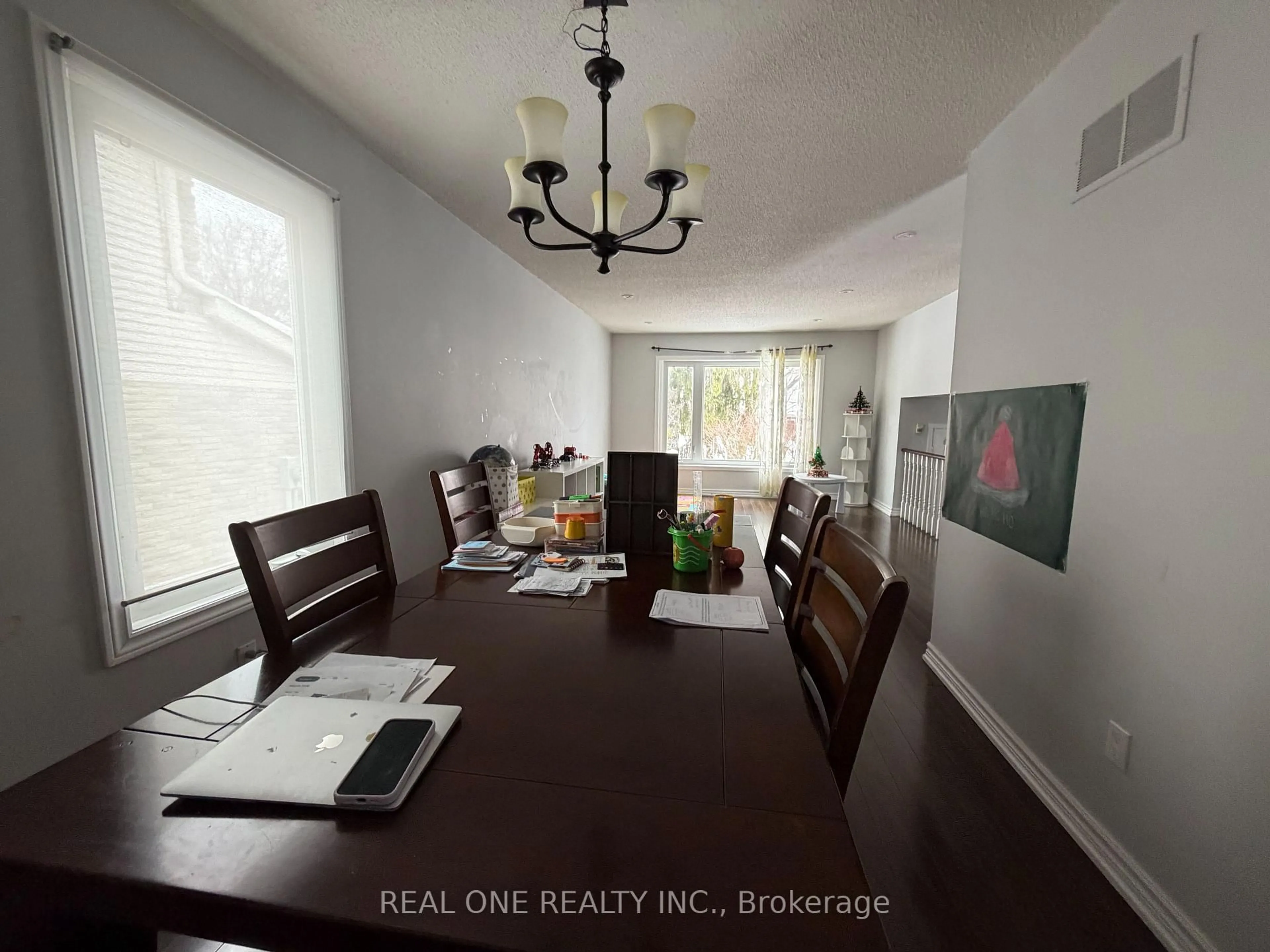 Dining room, wood/laminate floor for 9 Breckonwood Cres, Markham Ontario L3T 5G8