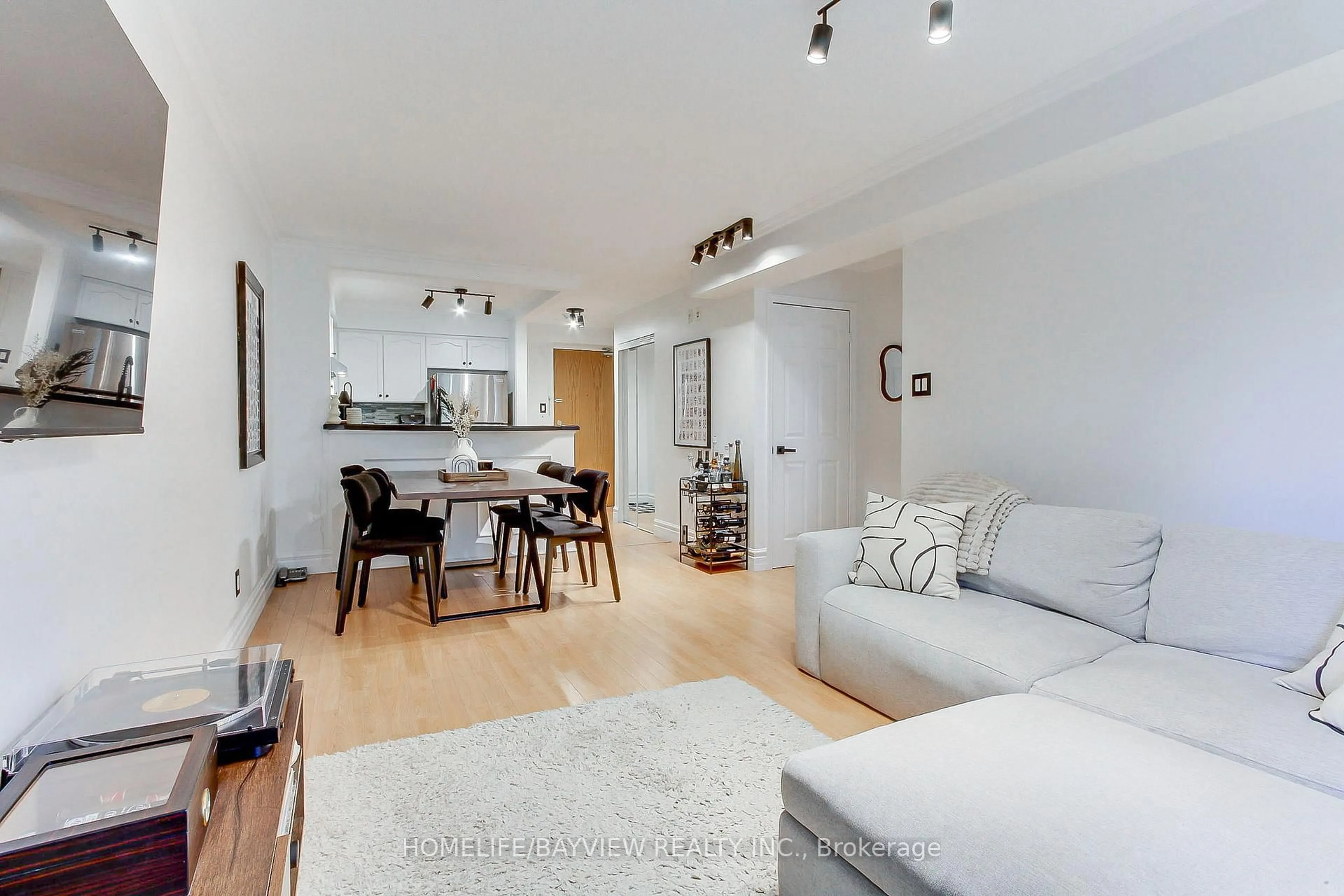 Living room with furniture, unknown for 245 Pine Grove Rd #110, Vaughan Ontario L4L 2H7