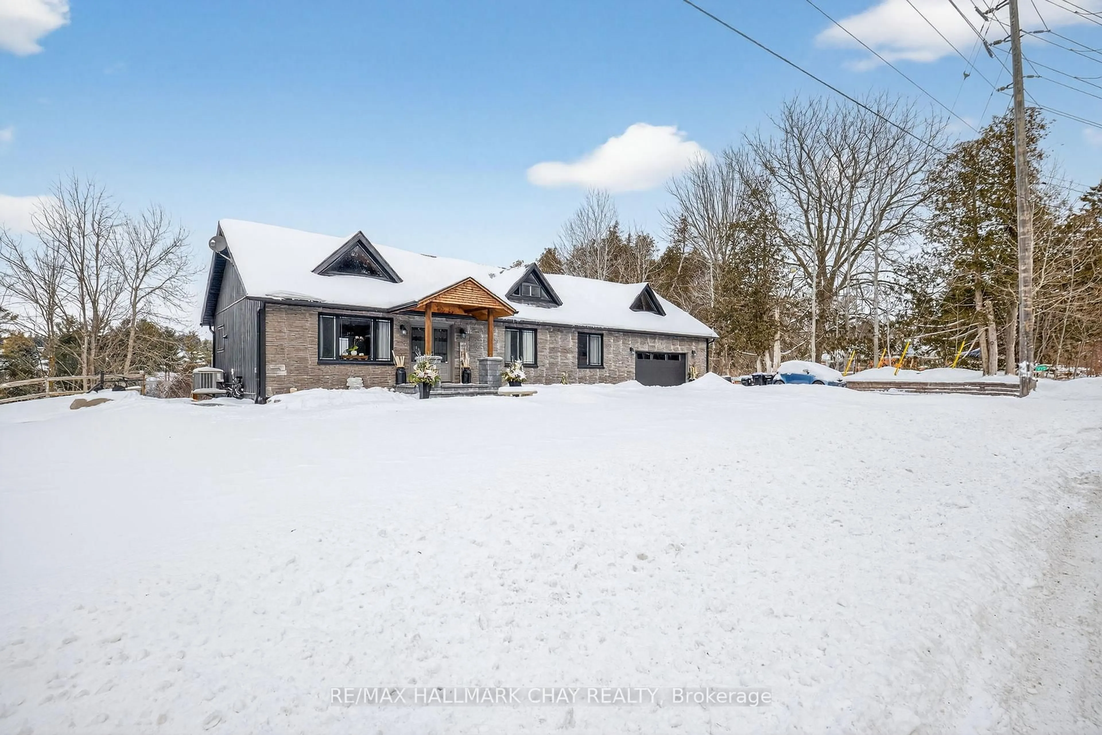 A pic from outside/outdoor area/front of a property/back of a property/a pic from drone, street for 6172 14th Line, New Tecumseth Ontario L9R 1N4