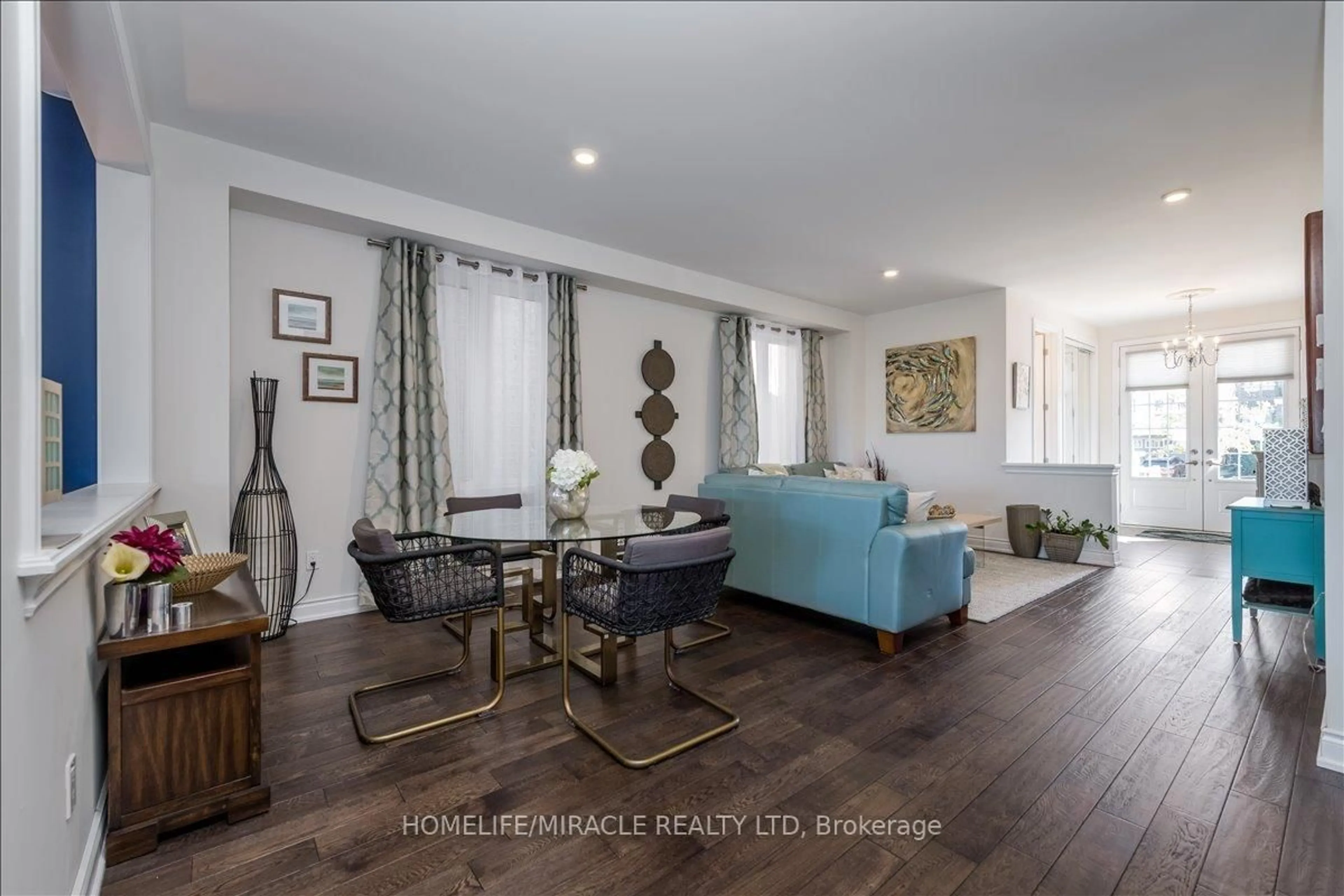 Living room with furniture, wood/laminate floor for 4 Kennedy Blvd, New Tecumseth Ontario L9R 0L4