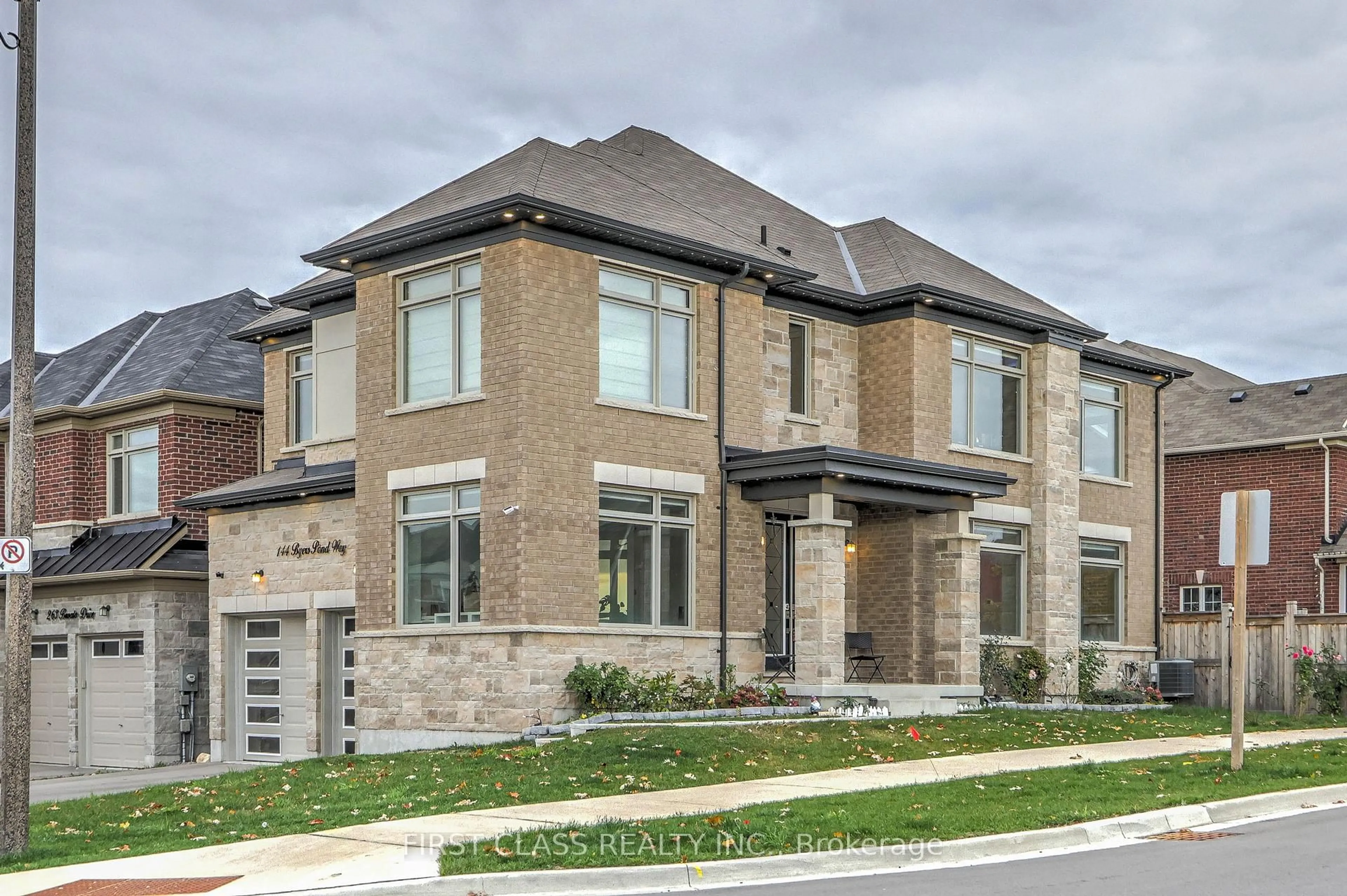 Home with brick exterior material, street for 144 Byers Pond Way, Whitchurch-Stouffville Ontario L4A 4X3
