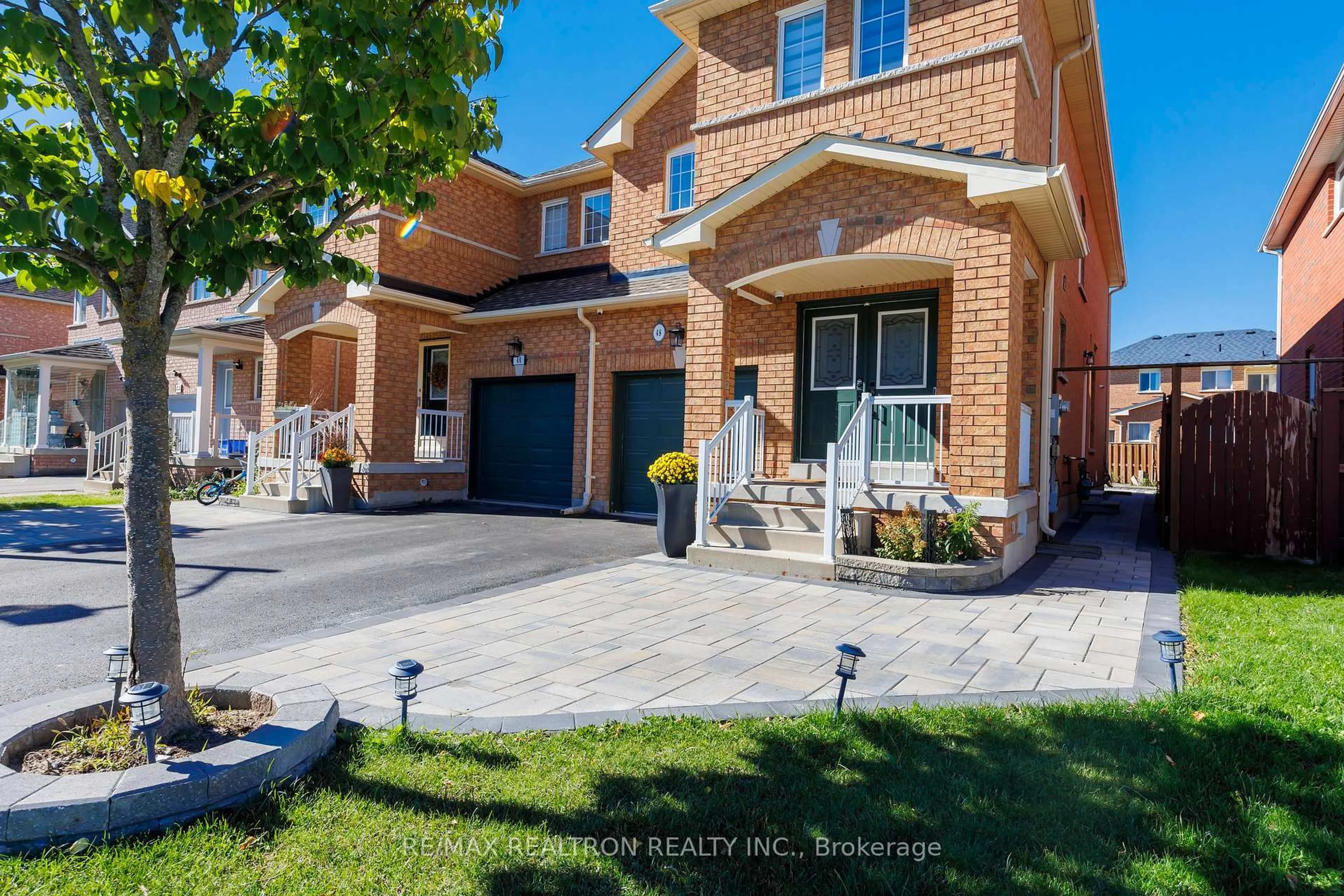 Home with brick exterior material, street for 48 Briarcrest Dr, Markham Ontario L6C 3E7