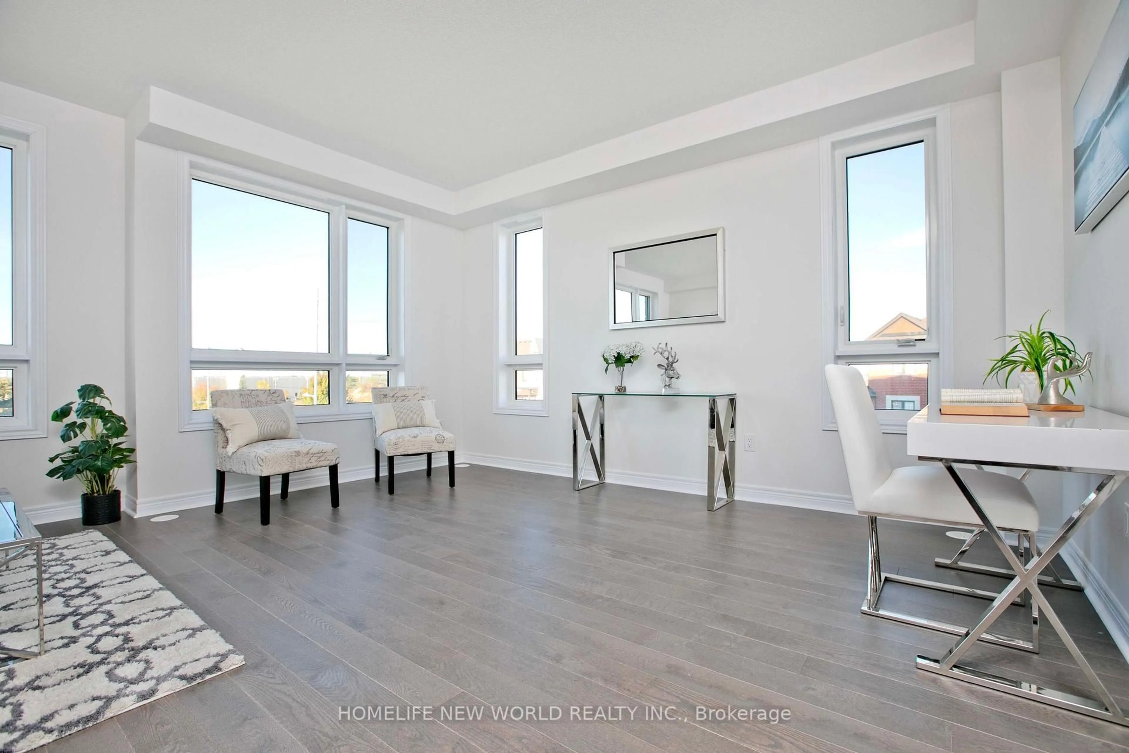 Living room with furniture, wood/laminate floor for 117 Mumbai Dr, Markham Ontario L3S 0G3