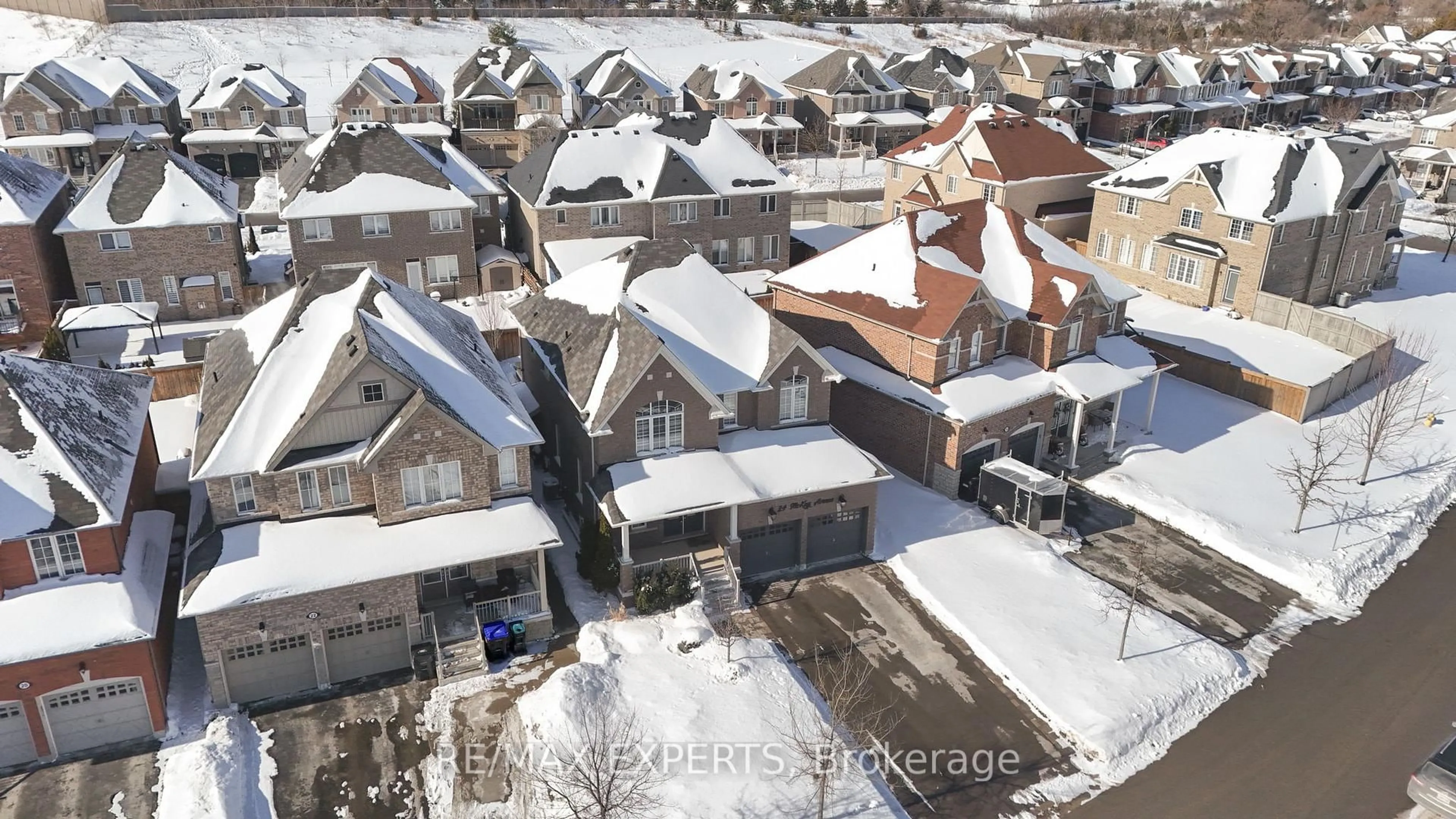 A pic from outside/outdoor area/front of a property/back of a property/a pic from drone, street for 24 Mckay Ave, New Tecumseth Ontario L0G 1W0