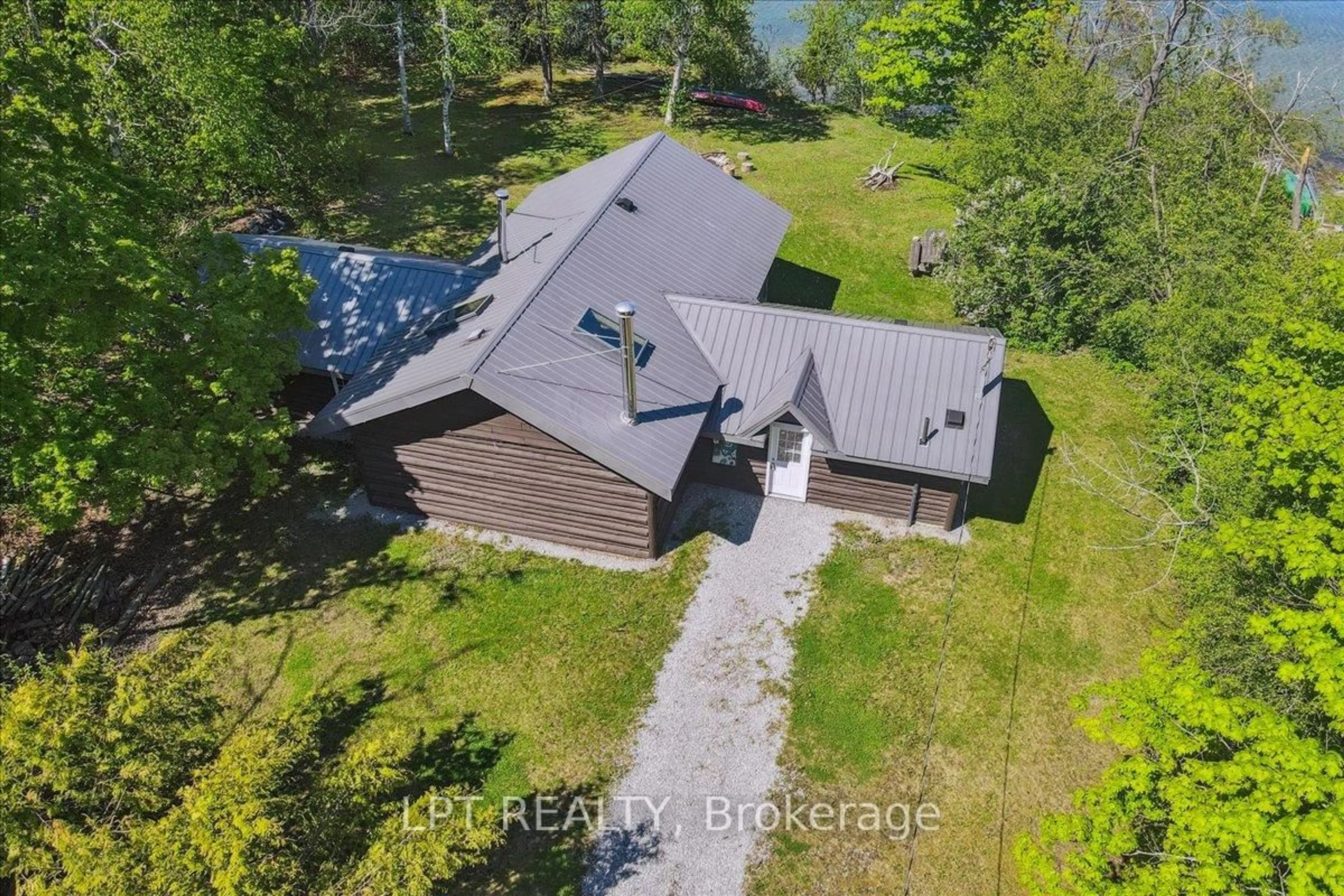 A pic from outside/outdoor area/front of a property/back of a property/a pic from drone, unknown for 1689 Chief Joseph Snake Rd, Georgina Islands Ontario L0E 1R0