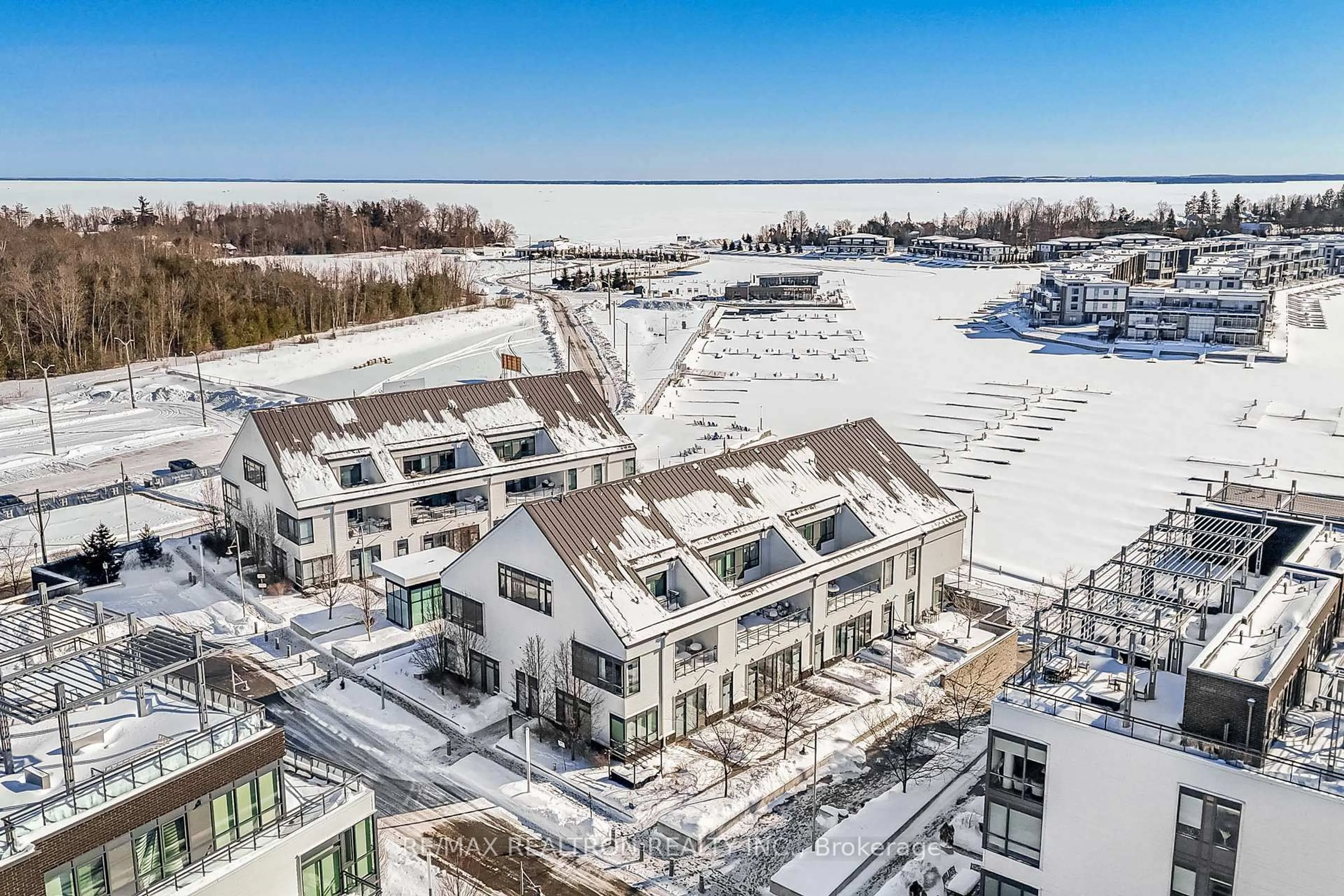 A pic from outside/outdoor area/front of a property/back of a property/a pic from drone, unknown for 247 Broward Way #31, Innisfil Ontario L9S 0M1