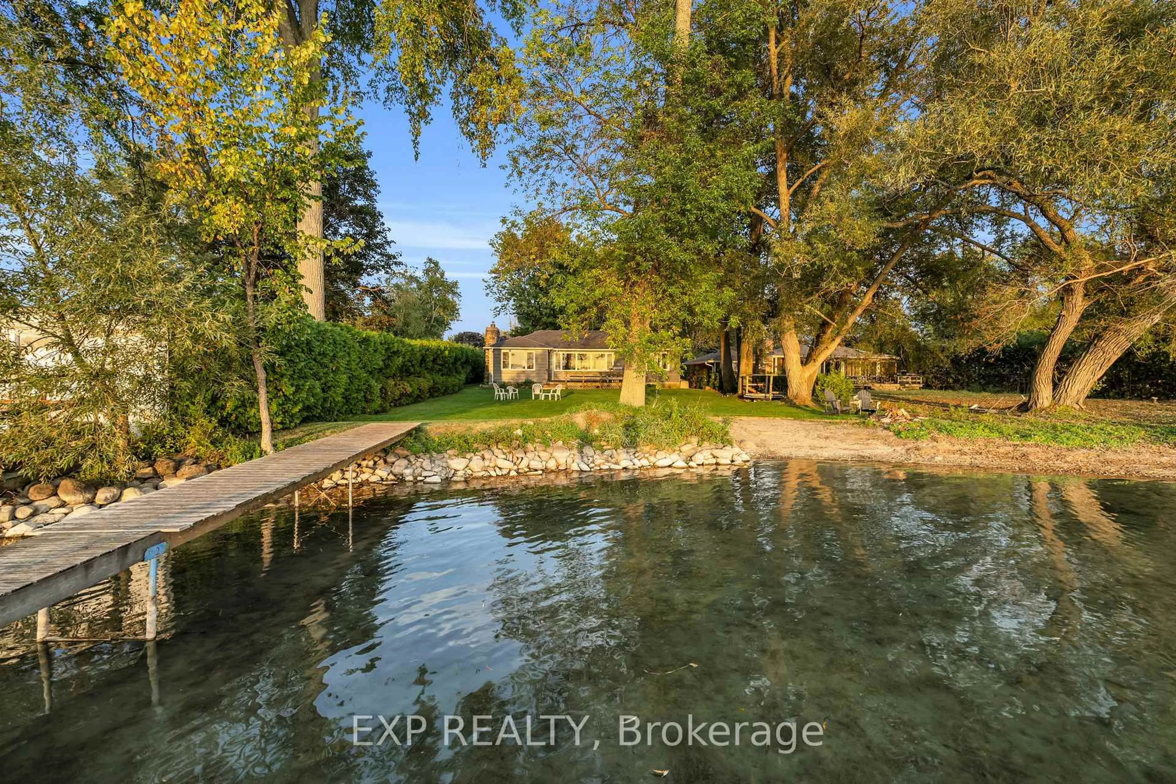 A pic from outside/outdoor area/front of a property/back of a property/a pic from drone, water/lake/river/ocean view for 28 McRae Beach Rd, Georgina Ontario L0E 1L0