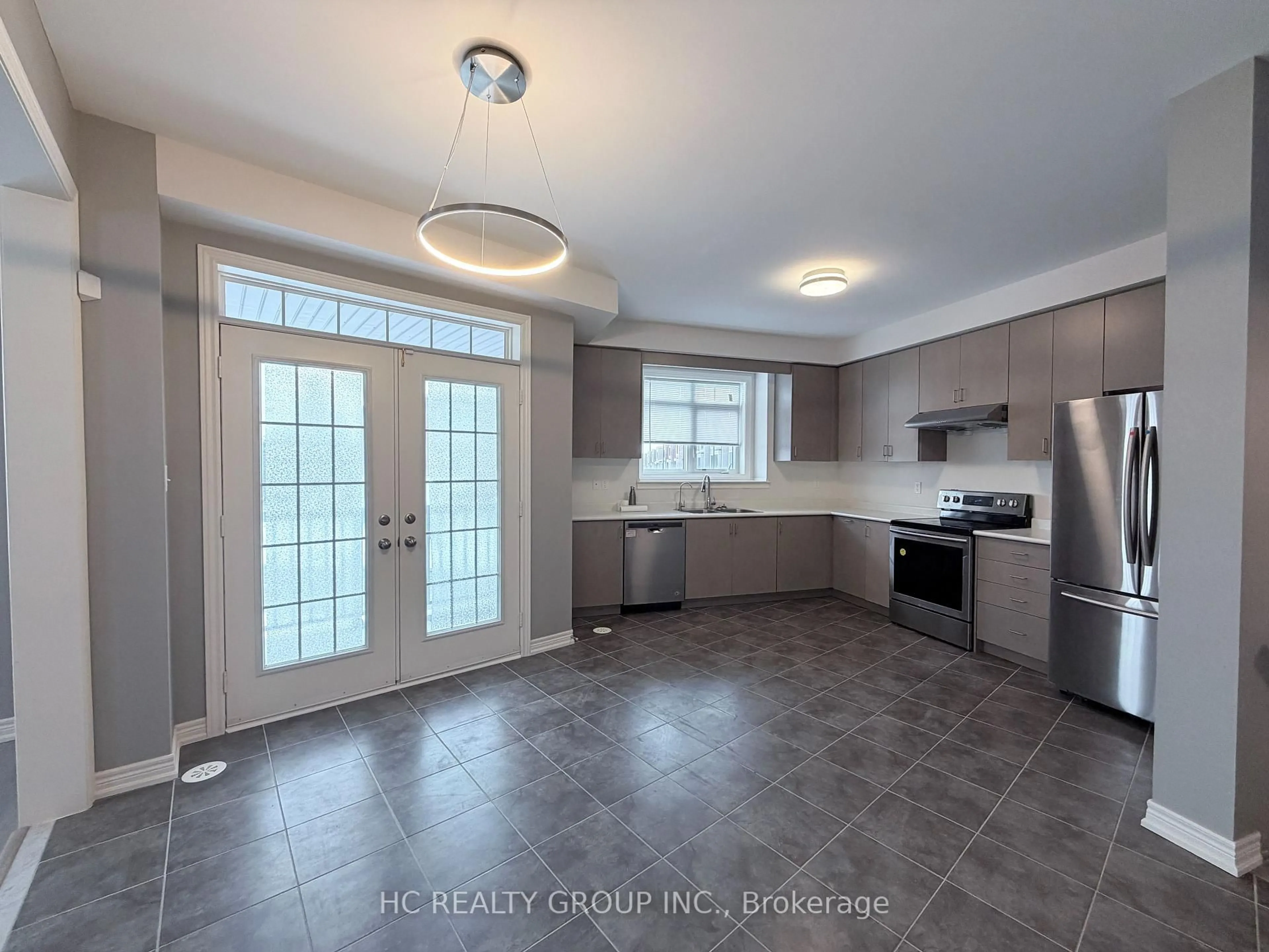 Open concept kitchen, ceramic/tile floor for 152 Roy Grove Way, Markham Ontario L3P 5Y7