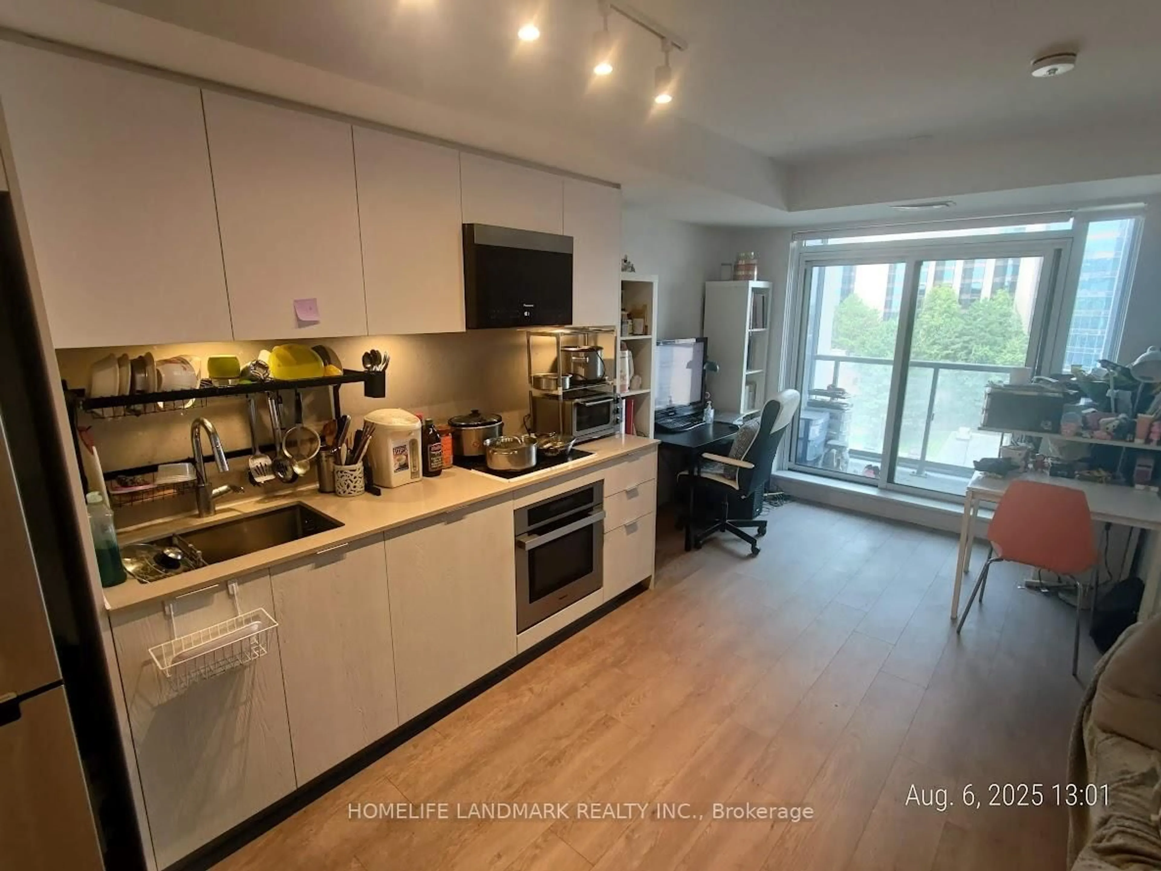 Open concept kitchen, wood/laminate floor for 9 Clegg Rd #917, Markham Ontario L6G 0H3