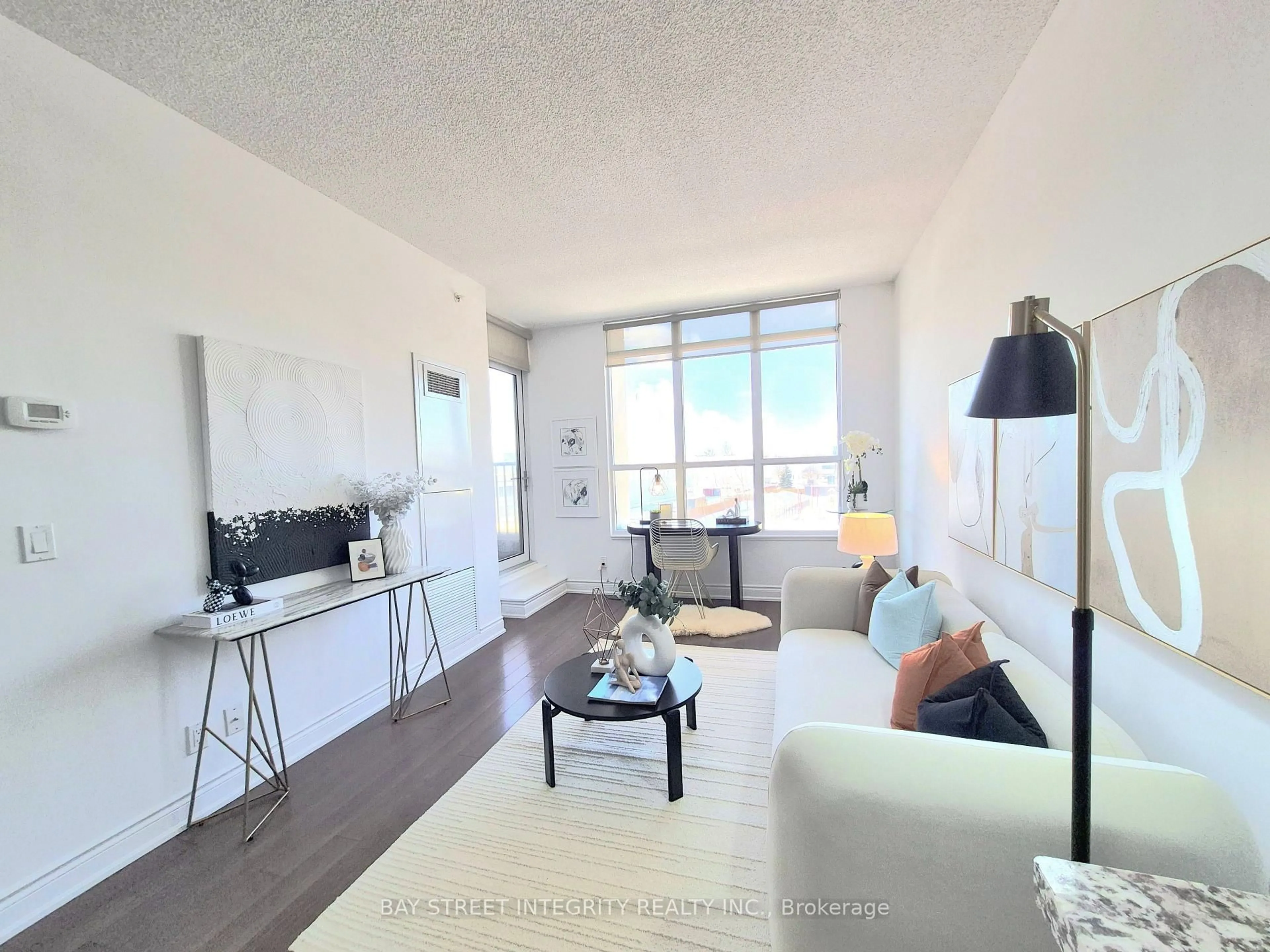 Living room with furniture, unknown for 99 South Town Centre Blvd #B318, Markham Ontario L6G 0E9