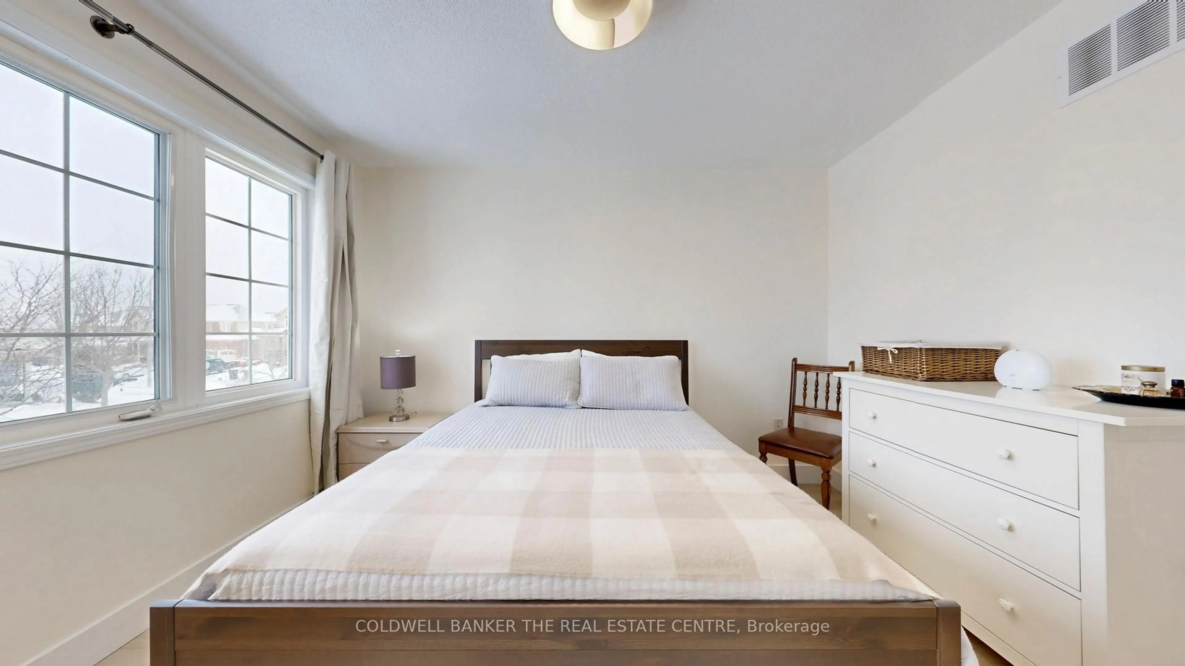 Bedroom with bed, wood/laminate floor for 40 Steele St, New Tecumseth Ontario L9R 0E6