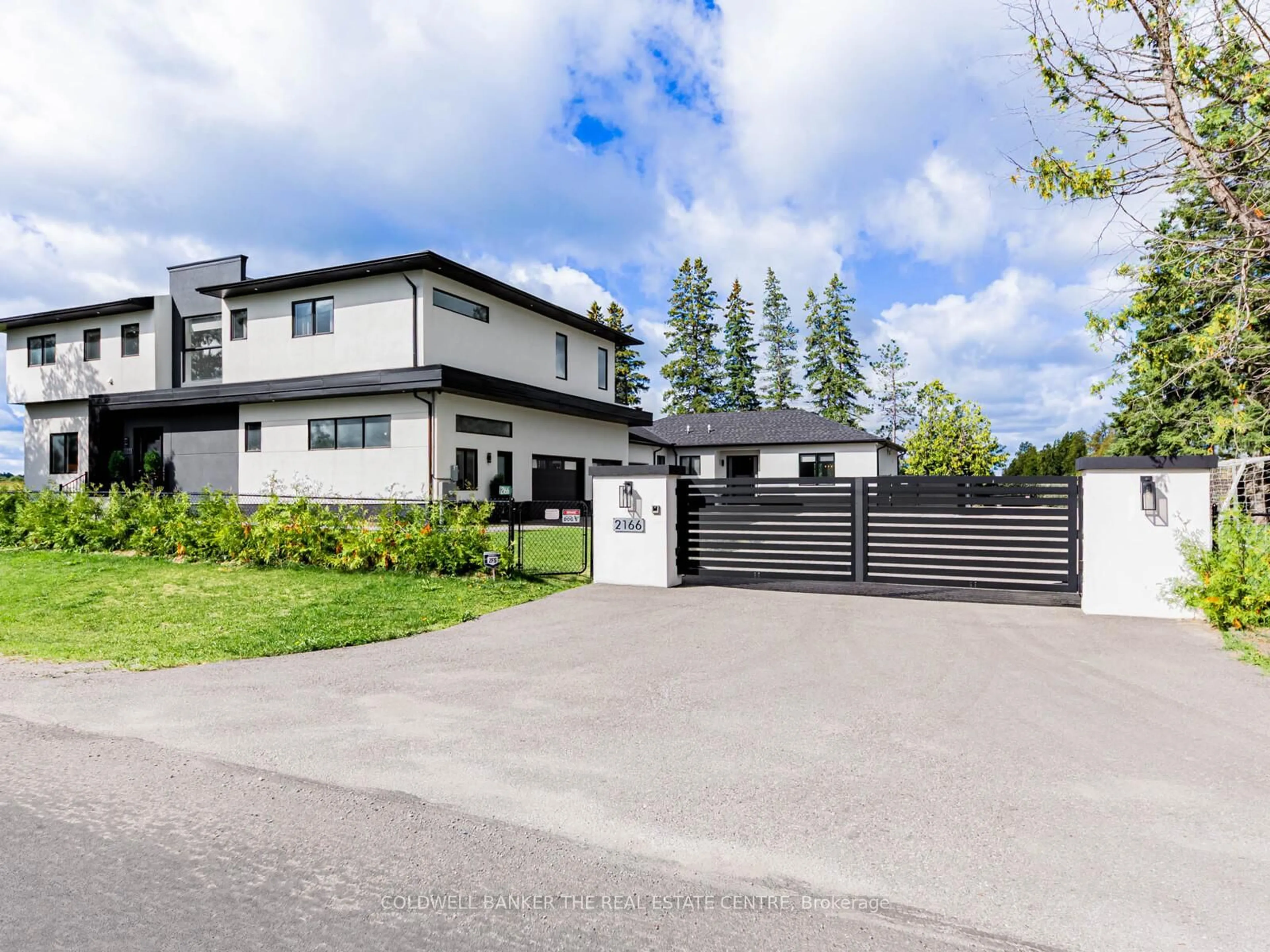 A pic from outside/outdoor area/front of a property/back of a property/a pic from drone, street for 2166 10th Sdrd, Bradford West Gwillimbury Ontario L3Z 2K9