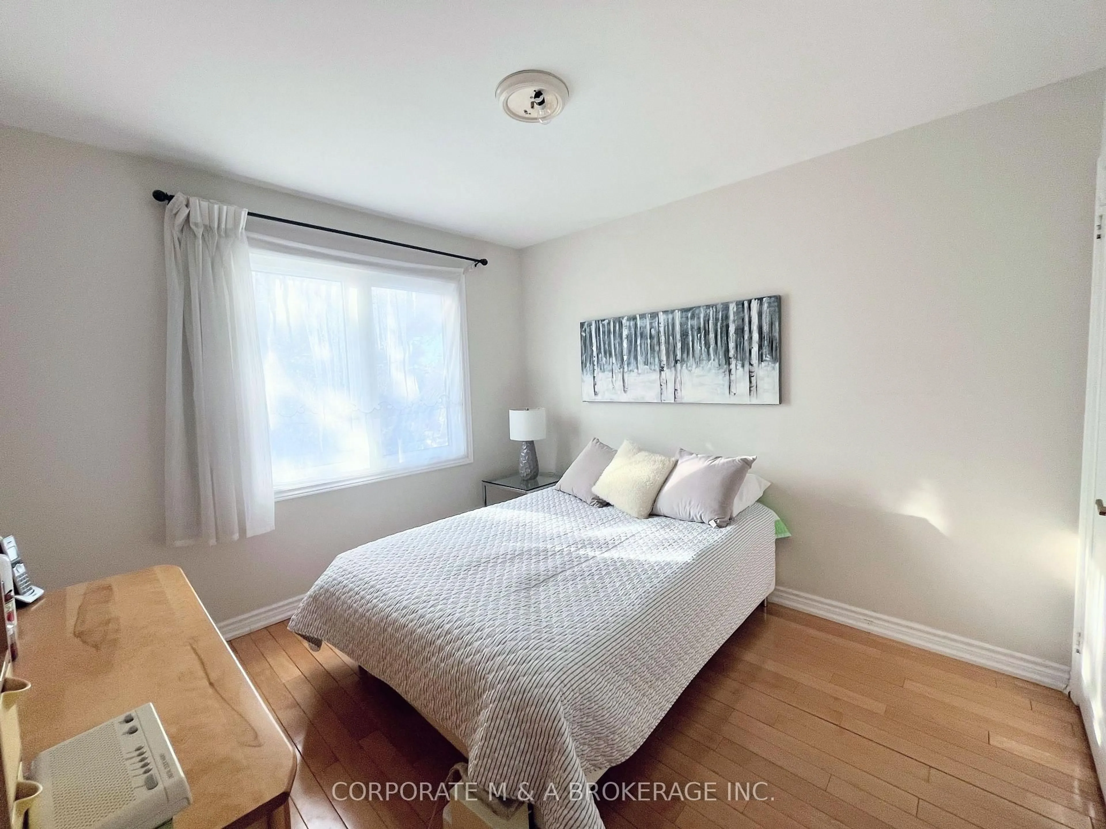 Bedroom with bed, wood/laminate floor for 86 Quail Valley Cres, Markham Ontario L3T 4R1