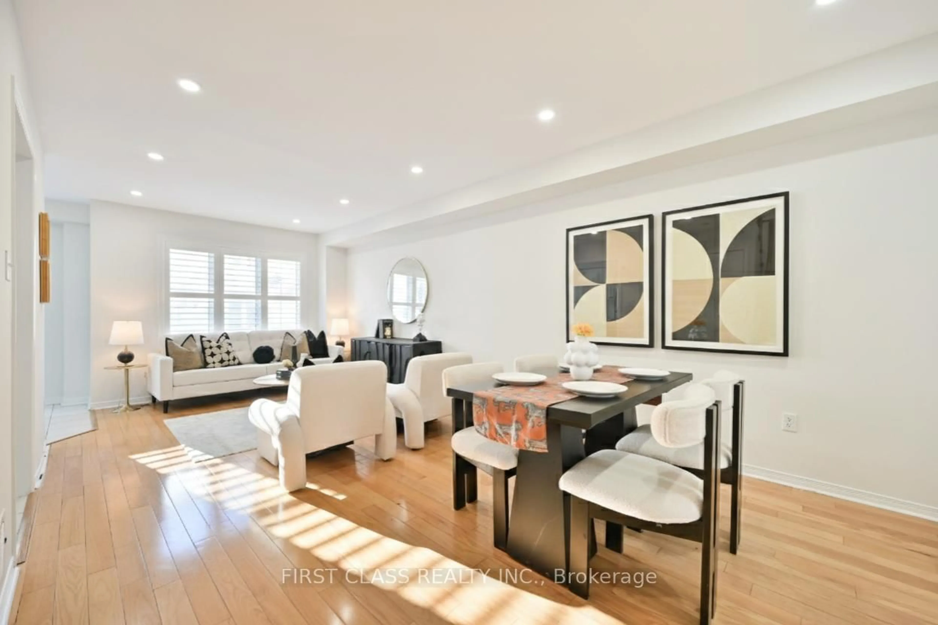 Living room with furniture, wood/laminate floor for 747 Joe Persechini Dr, Newmarket Ontario L3X 2S6