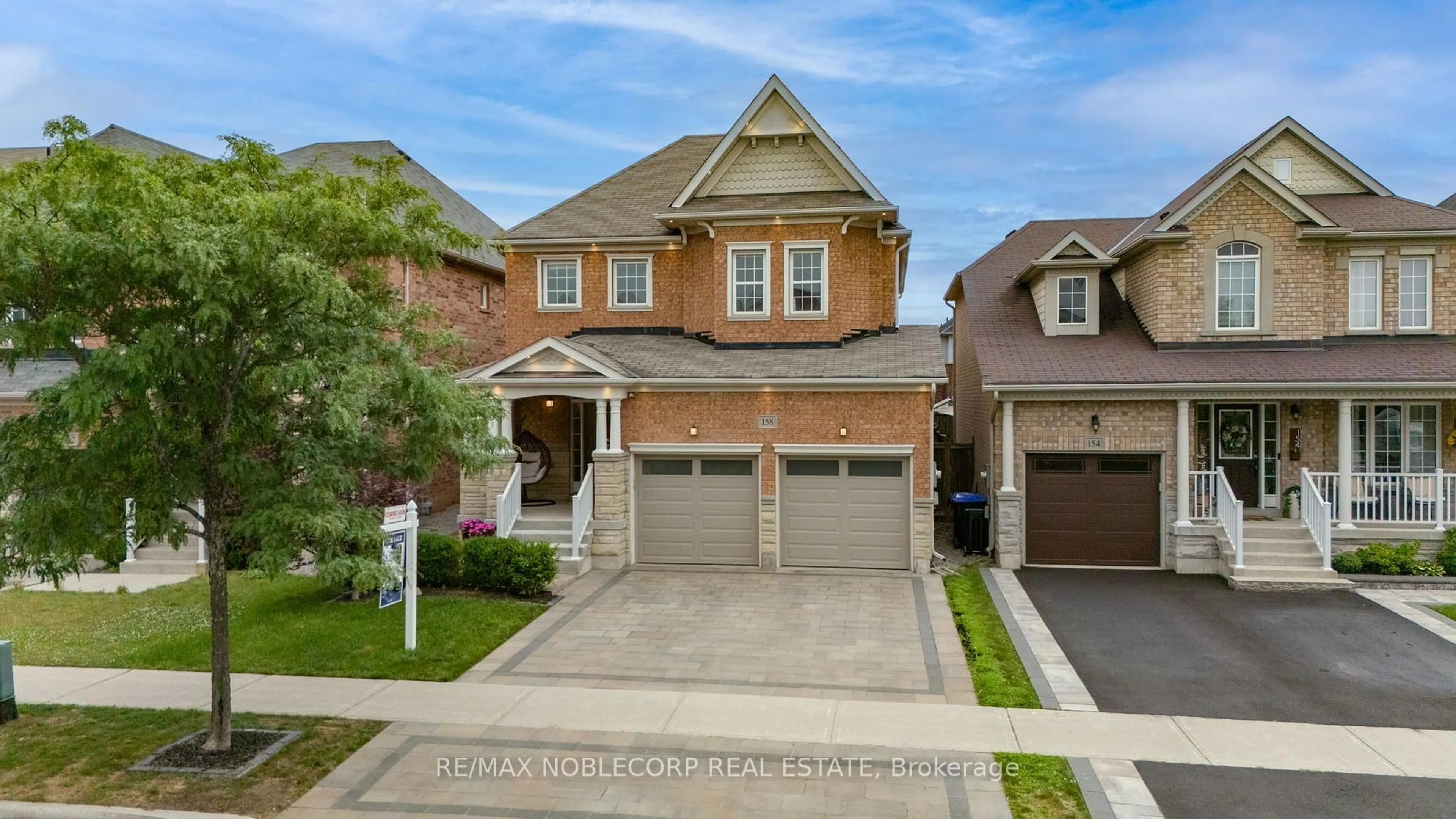 Home with brick exterior material, street for 158 Downy Emerald Dr, Bradford West Gwillimbury Ontario L3Z 0E6