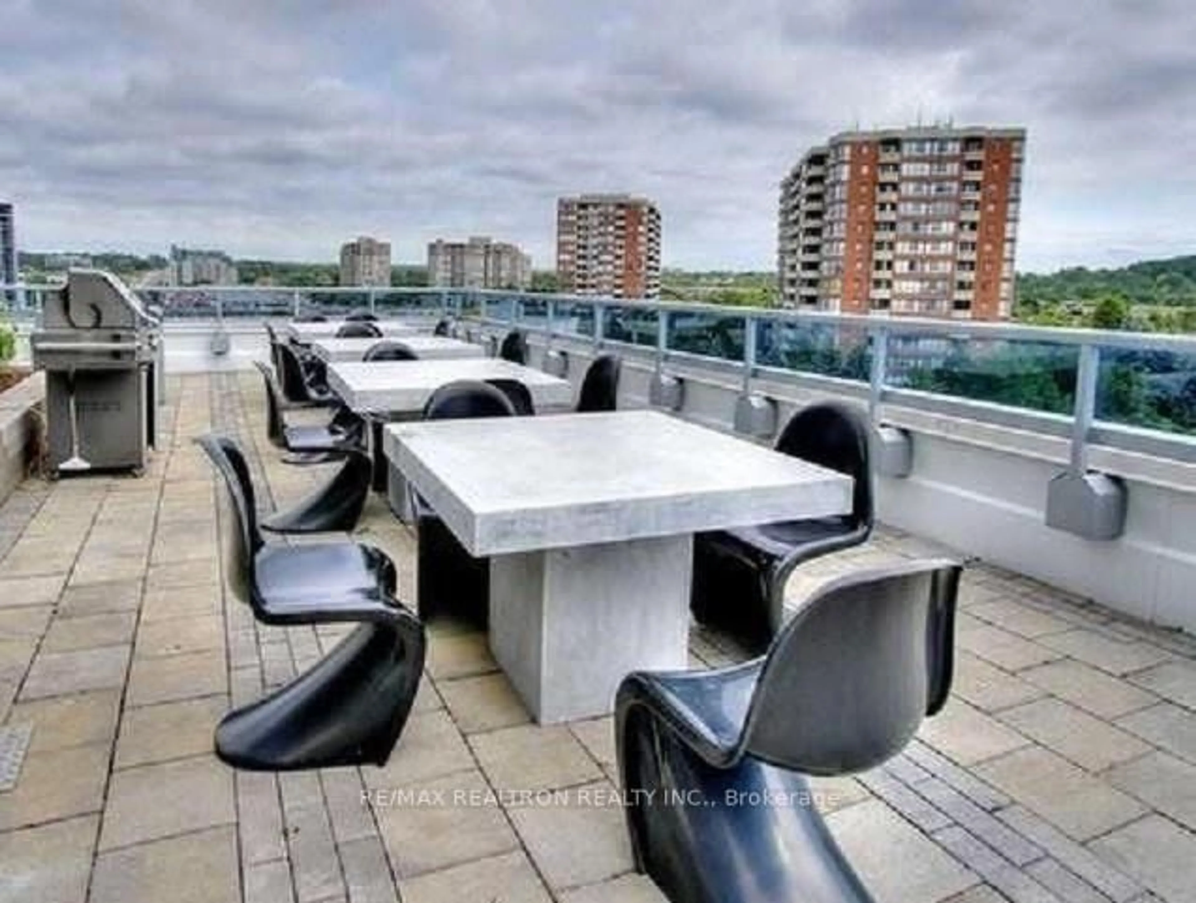 Patio, city buildings view from balcony for 9471 Yonge St #224, Richmond Hill Ontario L4C 1V4