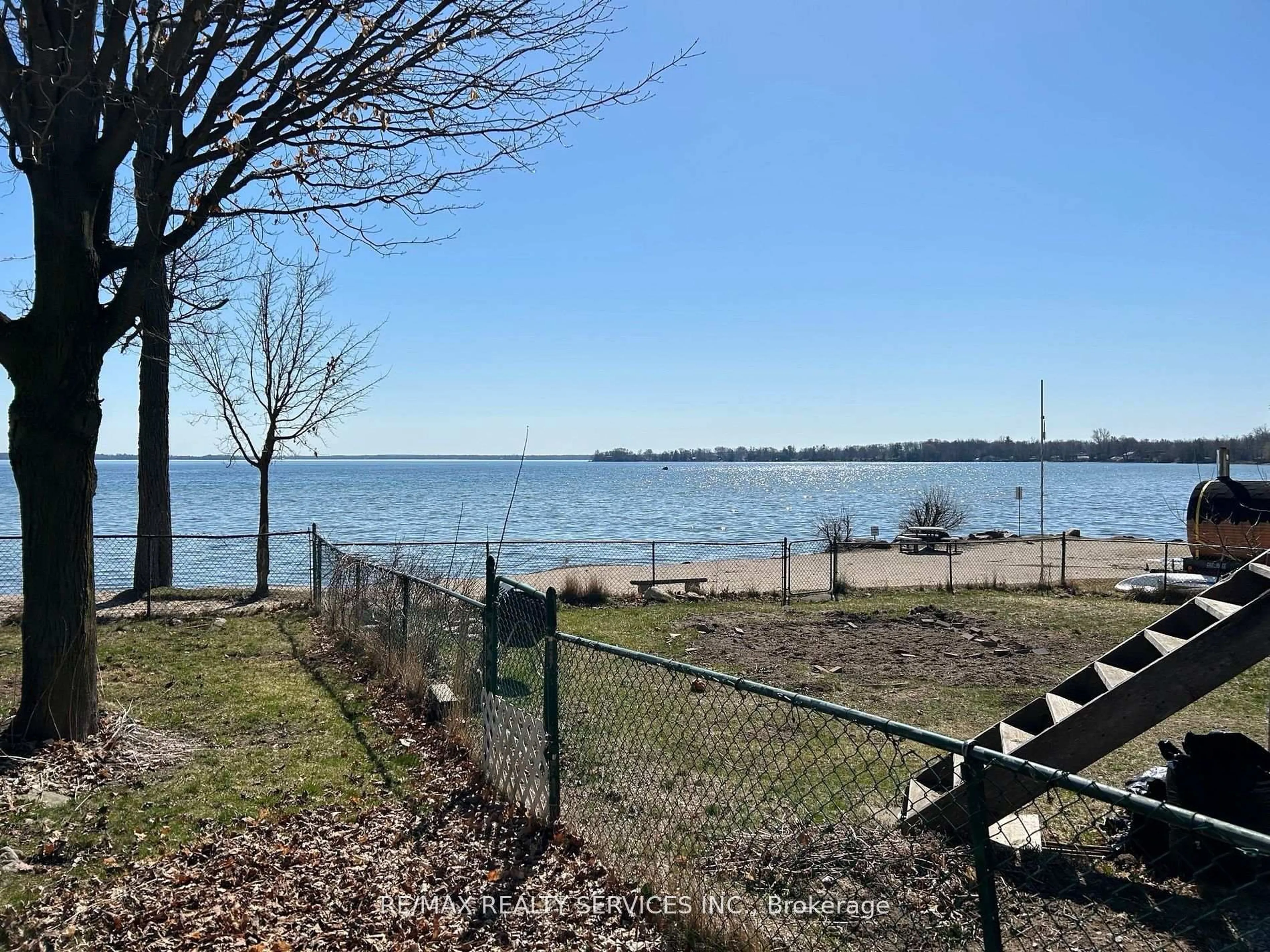 A pic from outside/outdoor area/front of a property/back of a property/a pic from drone, water/lake/river/ocean view for 907 Adams Rd, Innisfil Ontario L9S 4C9