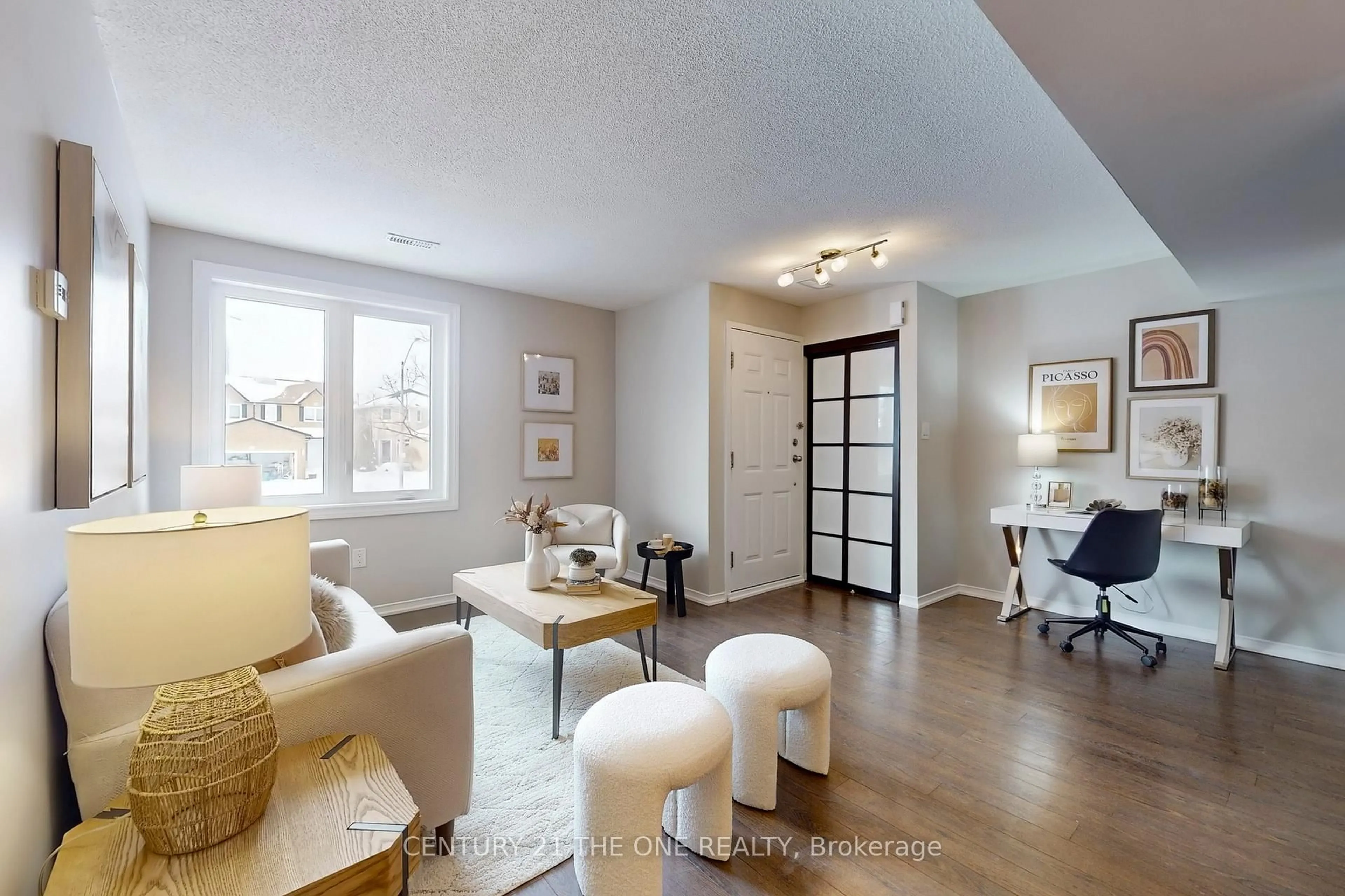 Living room with furniture, wood/laminate floor for 75 Weldrick Rd #1004, Richmond Hill Ontario L4C 0H9