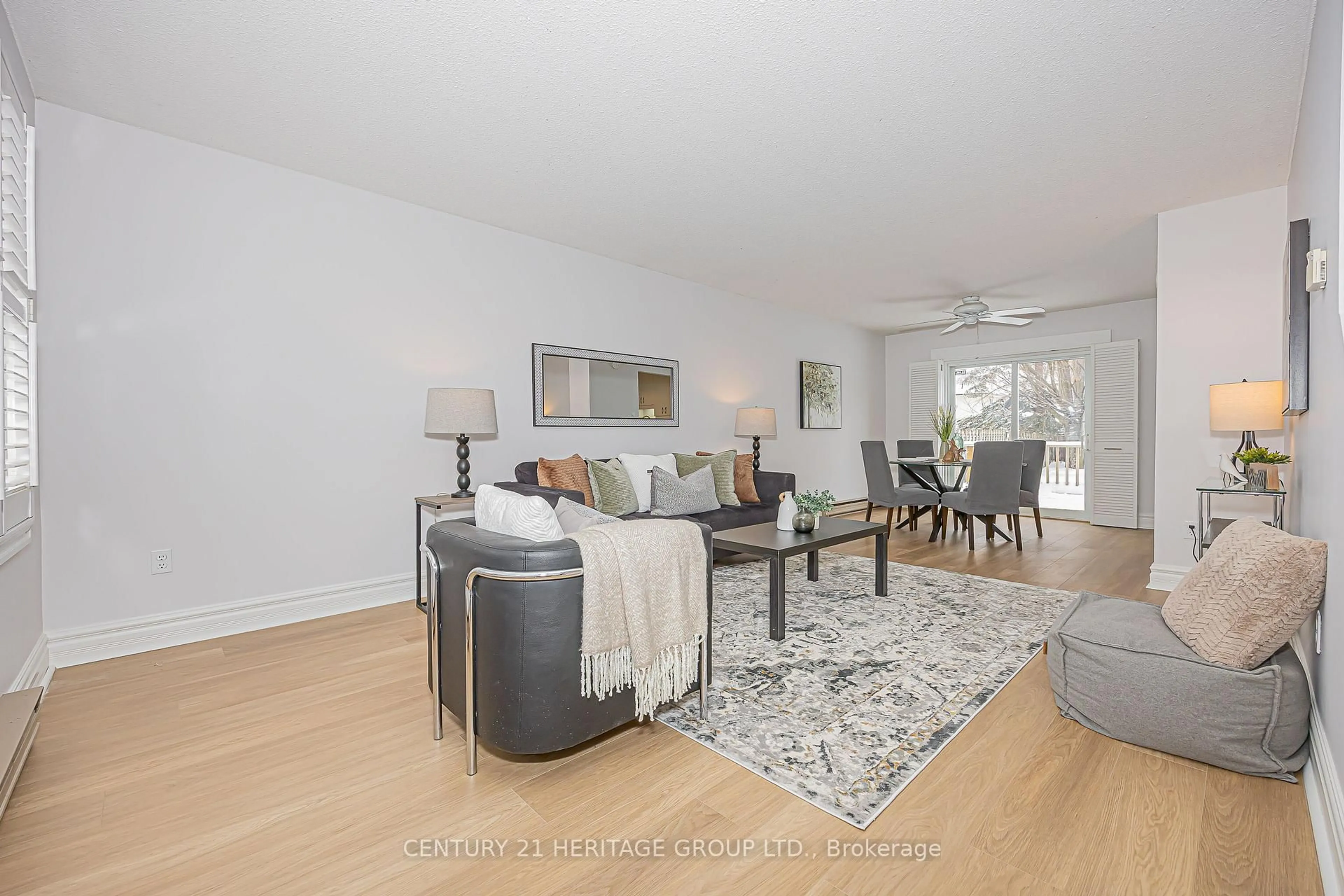 Living room with furniture, wood/laminate floor for 503 Sandford St, Newmarket Ontario L3Y 5E2