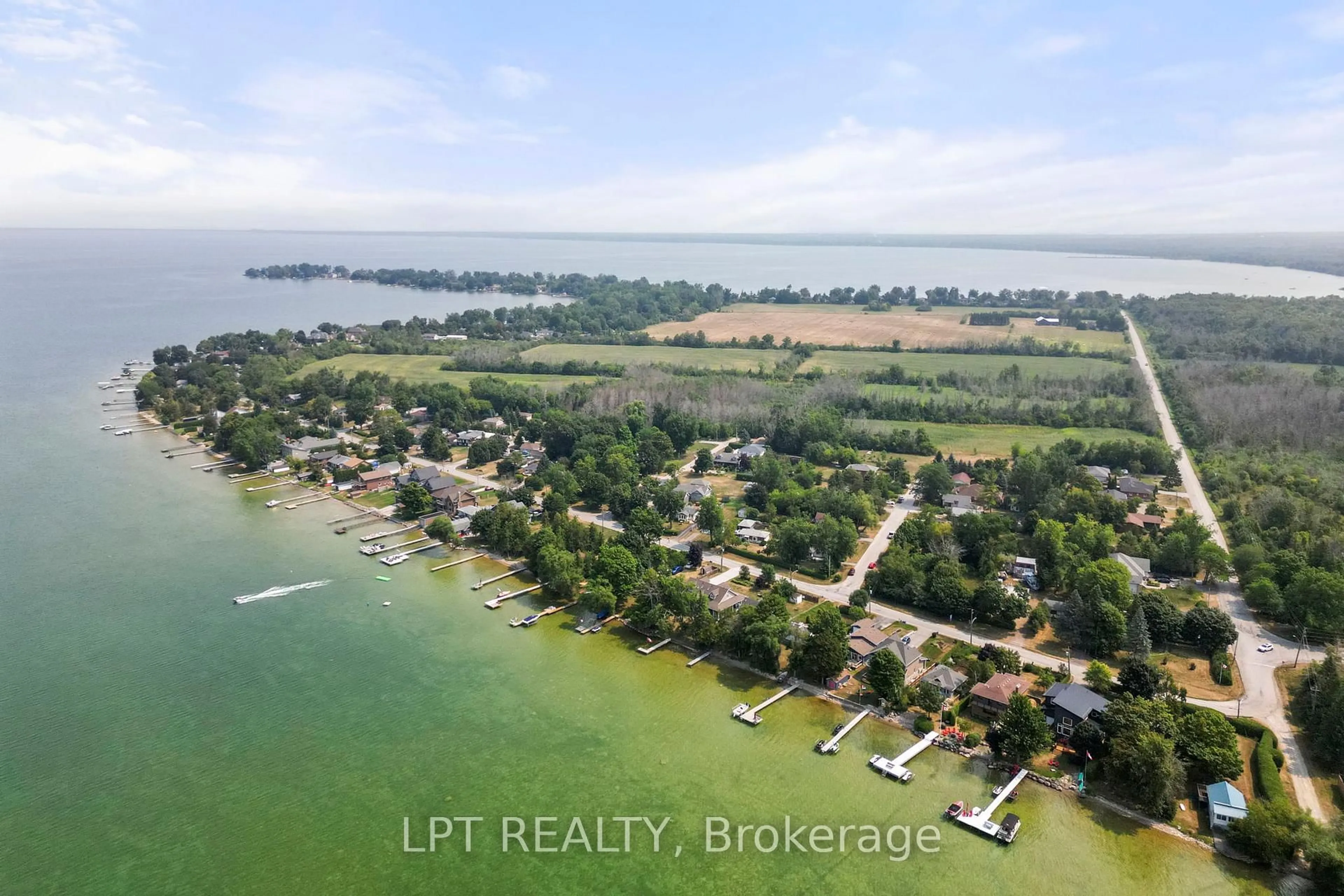 A pic from outside/outdoor area/front of a property/back of a property/a pic from drone, water/lake/river/ocean view for 22 Blue Heron Dr, Georgina Ontario L0E 1N0