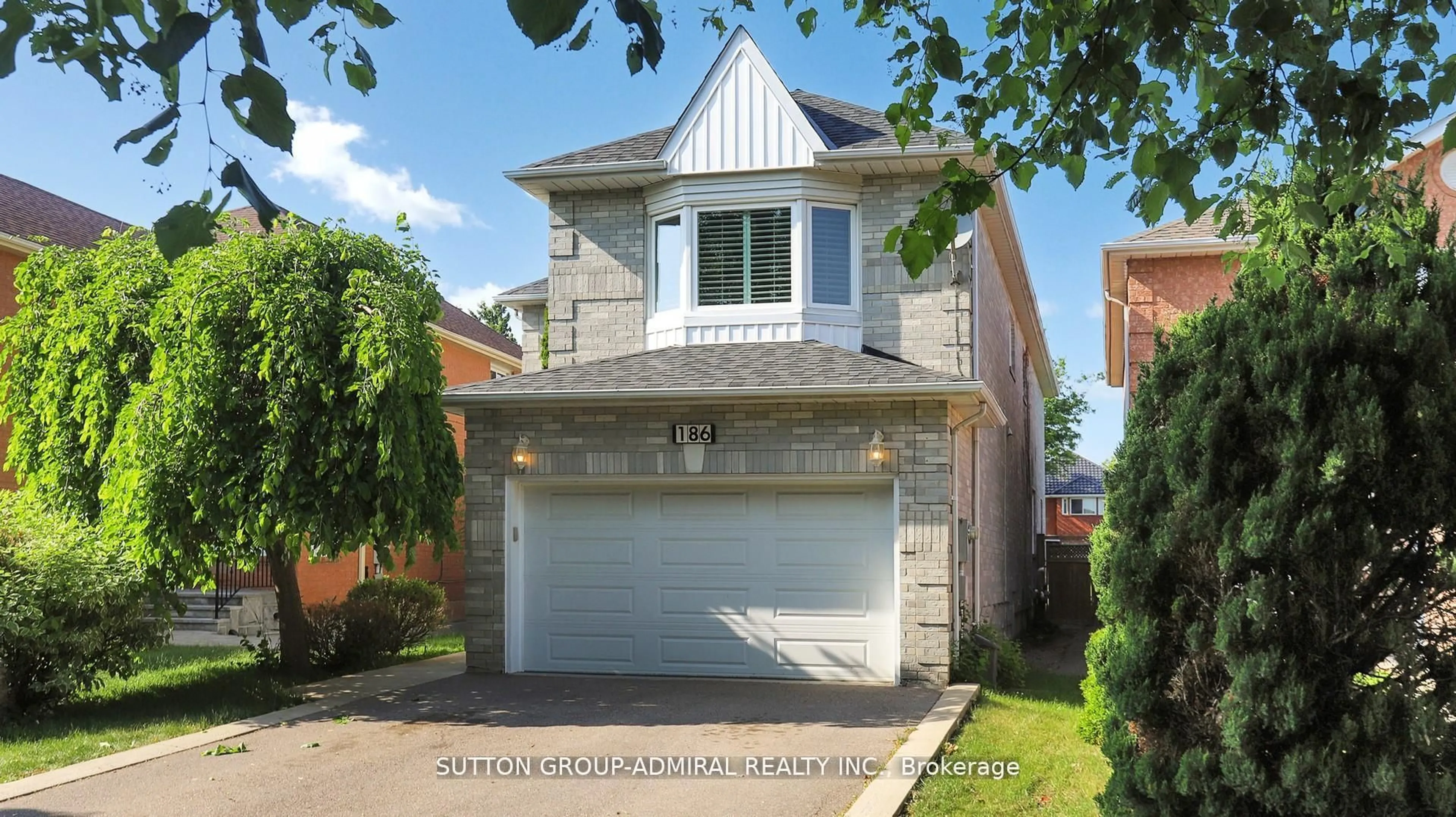 Home with brick exterior material, street for 186 WESTHAMPTON Dr, Vaughan Ontario L4J 7X2