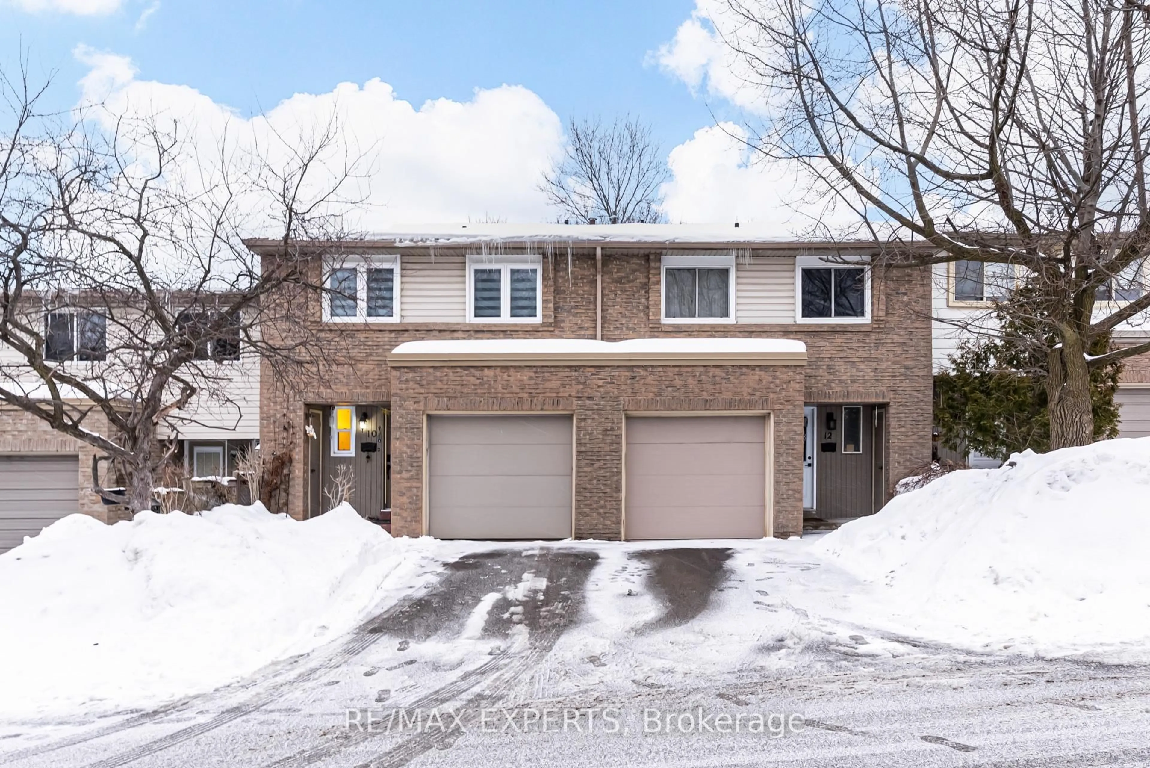 Home with brick exterior material, street for 10 Knightsbridge Way, Markham Ontario L3P 3W5
