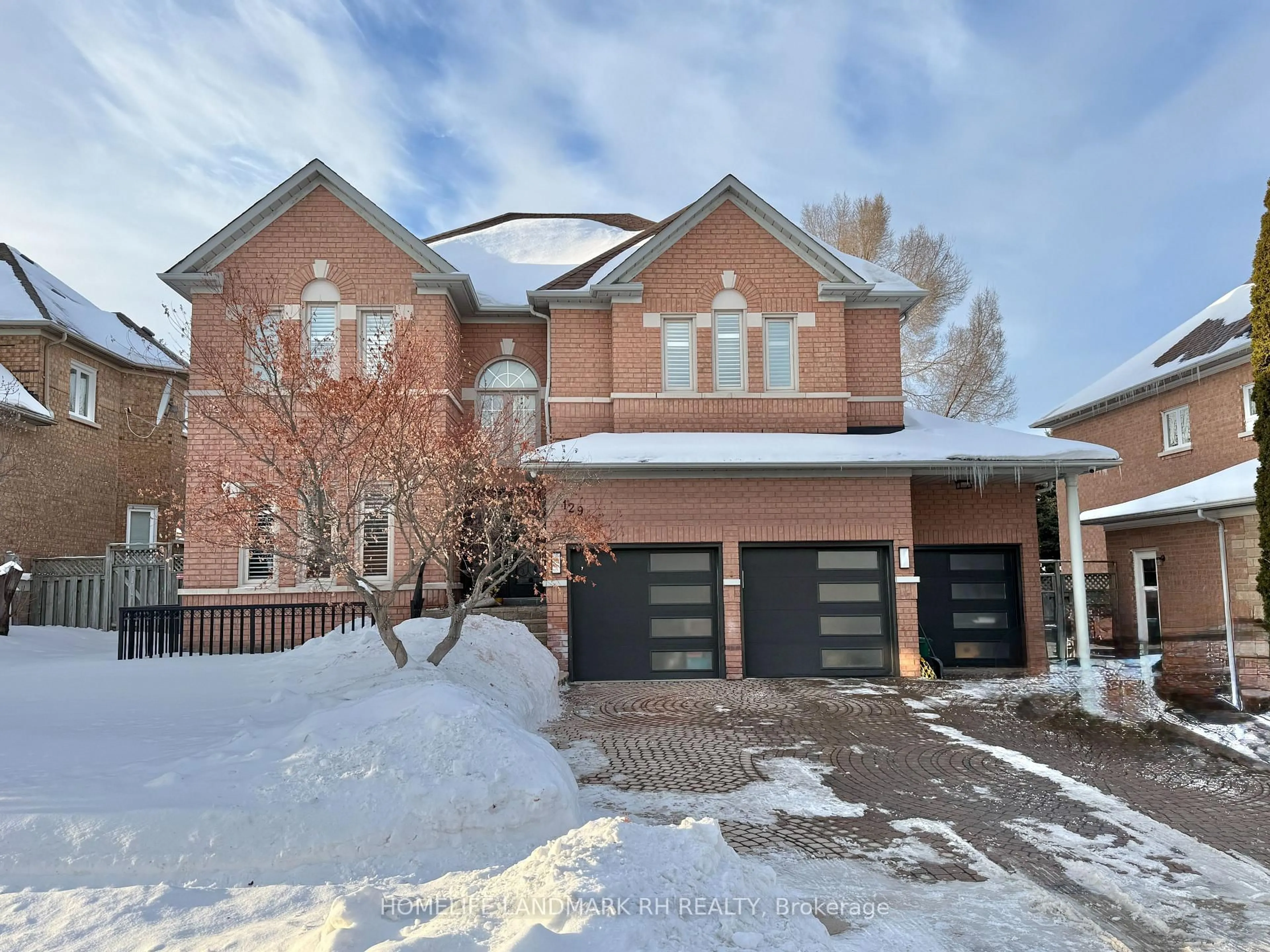 Home with brick exterior material, street for 129 Golden Tulip Cres, Markham Ontario L6C 1W5