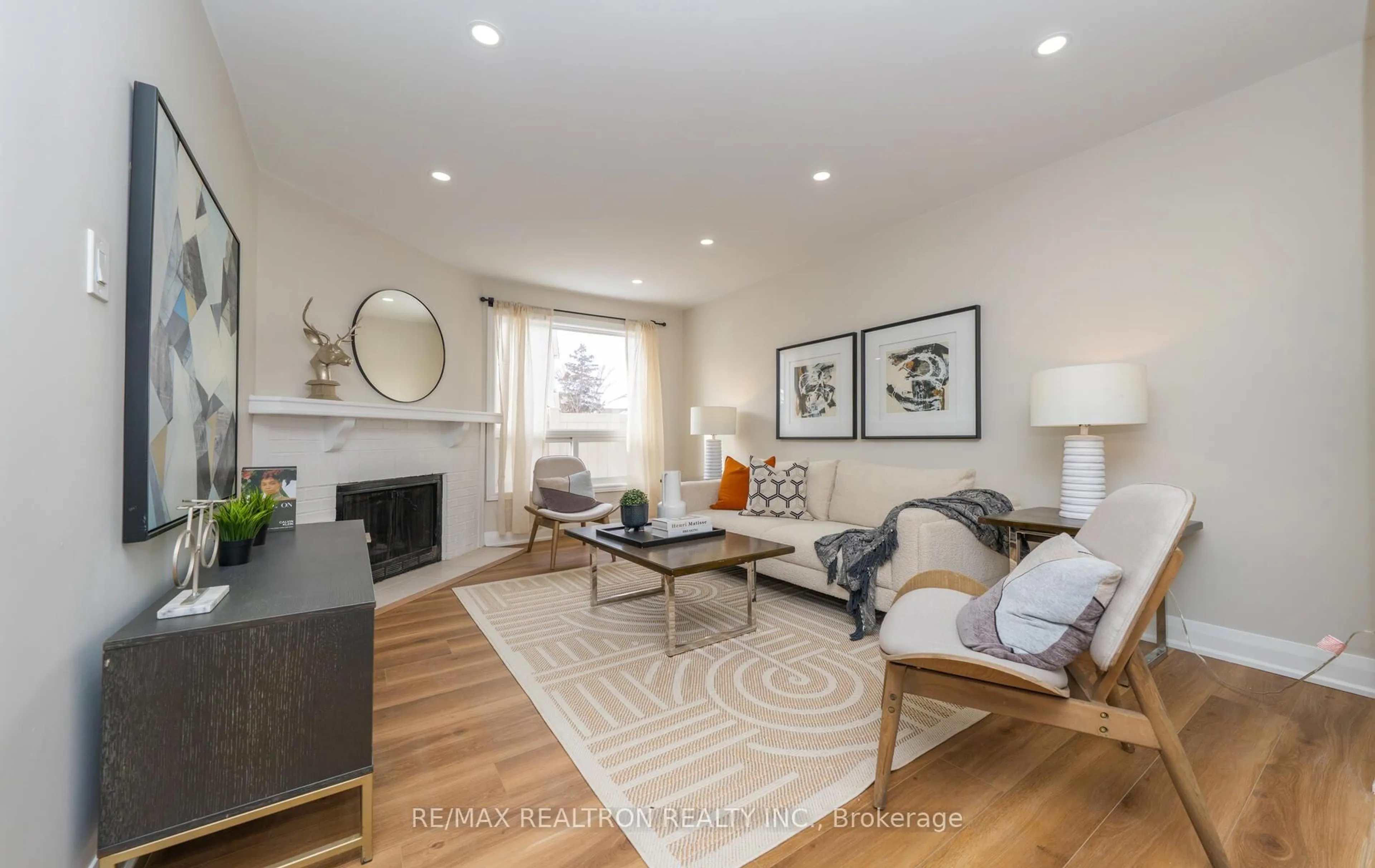 Living room with furniture, wood/laminate floor for 110 Lisa Cres, Vaughan Ontario L4J 2N3