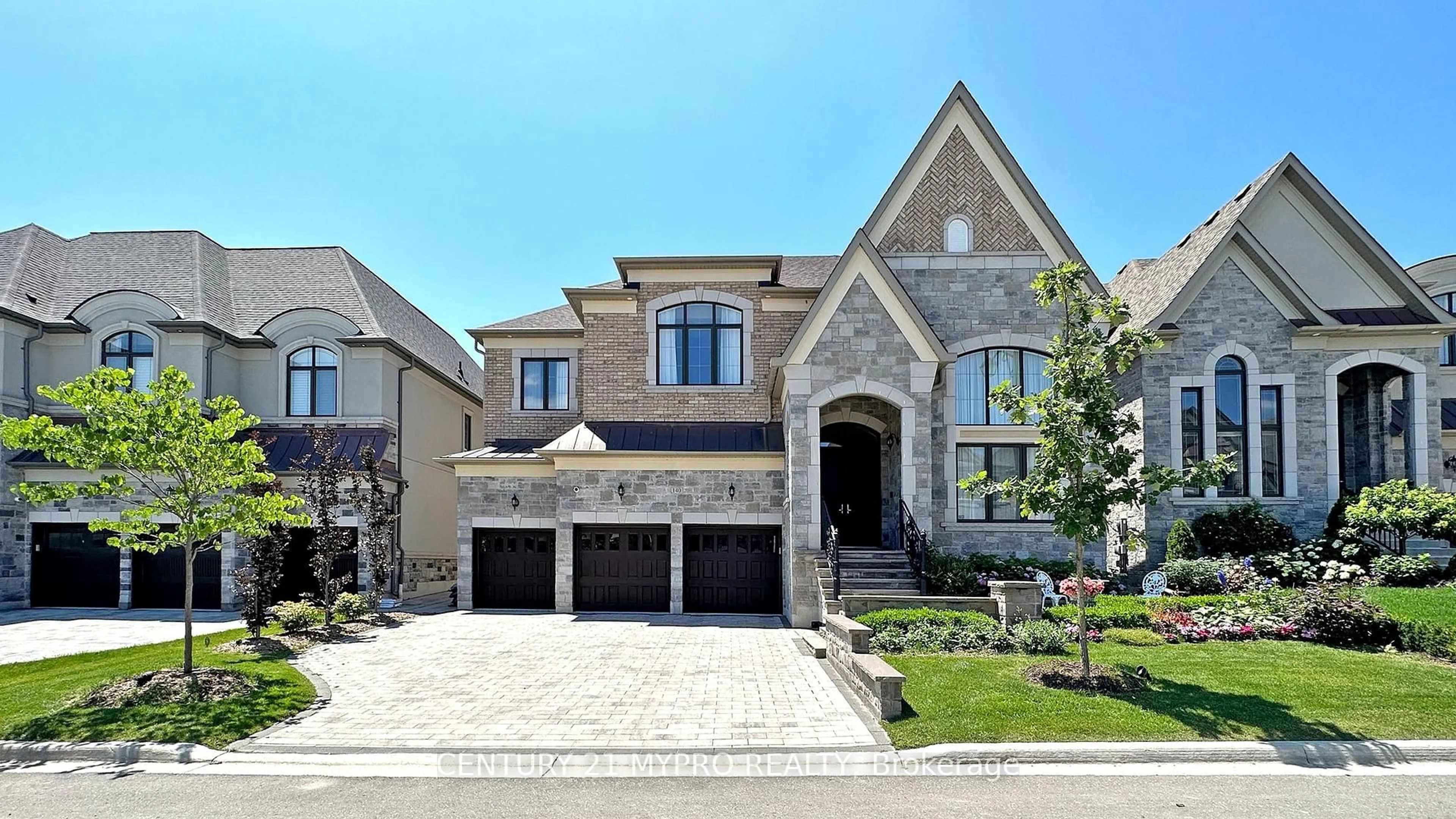 Home with brick exterior material, street for 140 Lady Jessica Dr, Vaughan Ontario L6A 4Z7