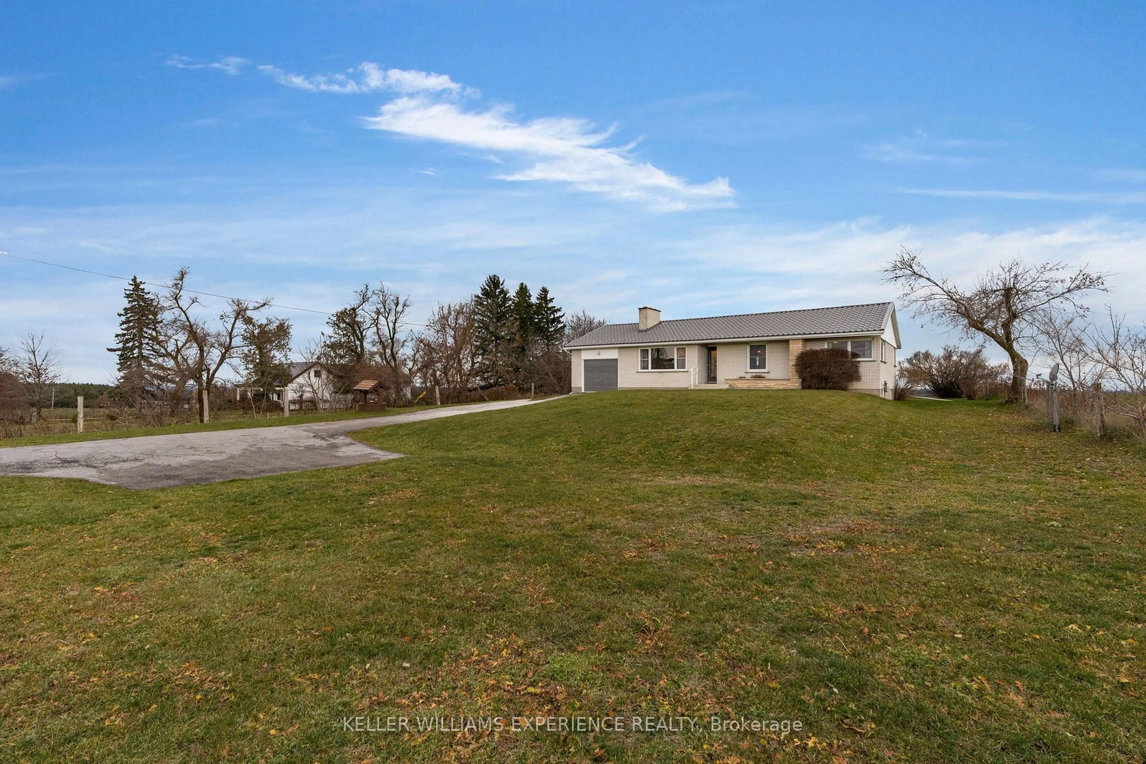 A pic from outside/outdoor area/front of a property/back of a property/a pic from drone, street for 5628 County Rd 27 Rd, Essa Ontario L0L 1L0