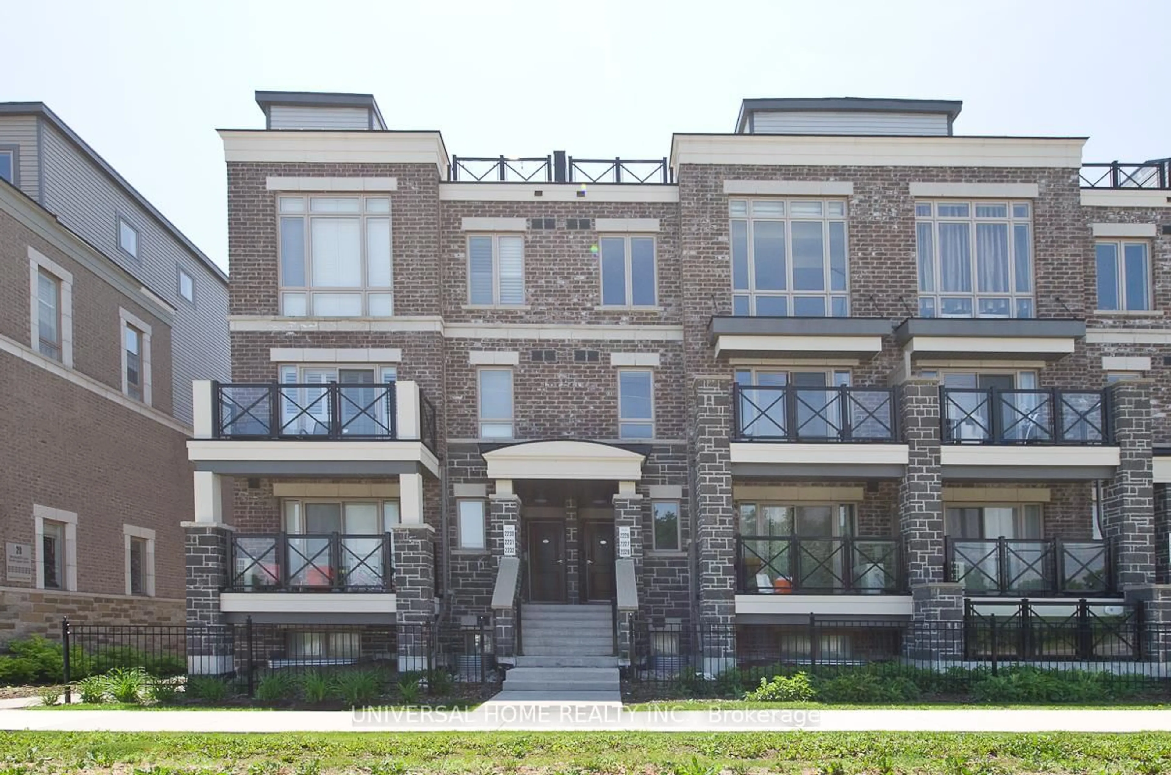 Home with brick exterior material, building for 10 Westmeath Lane #2227, Markham Ontario L6B 1N5