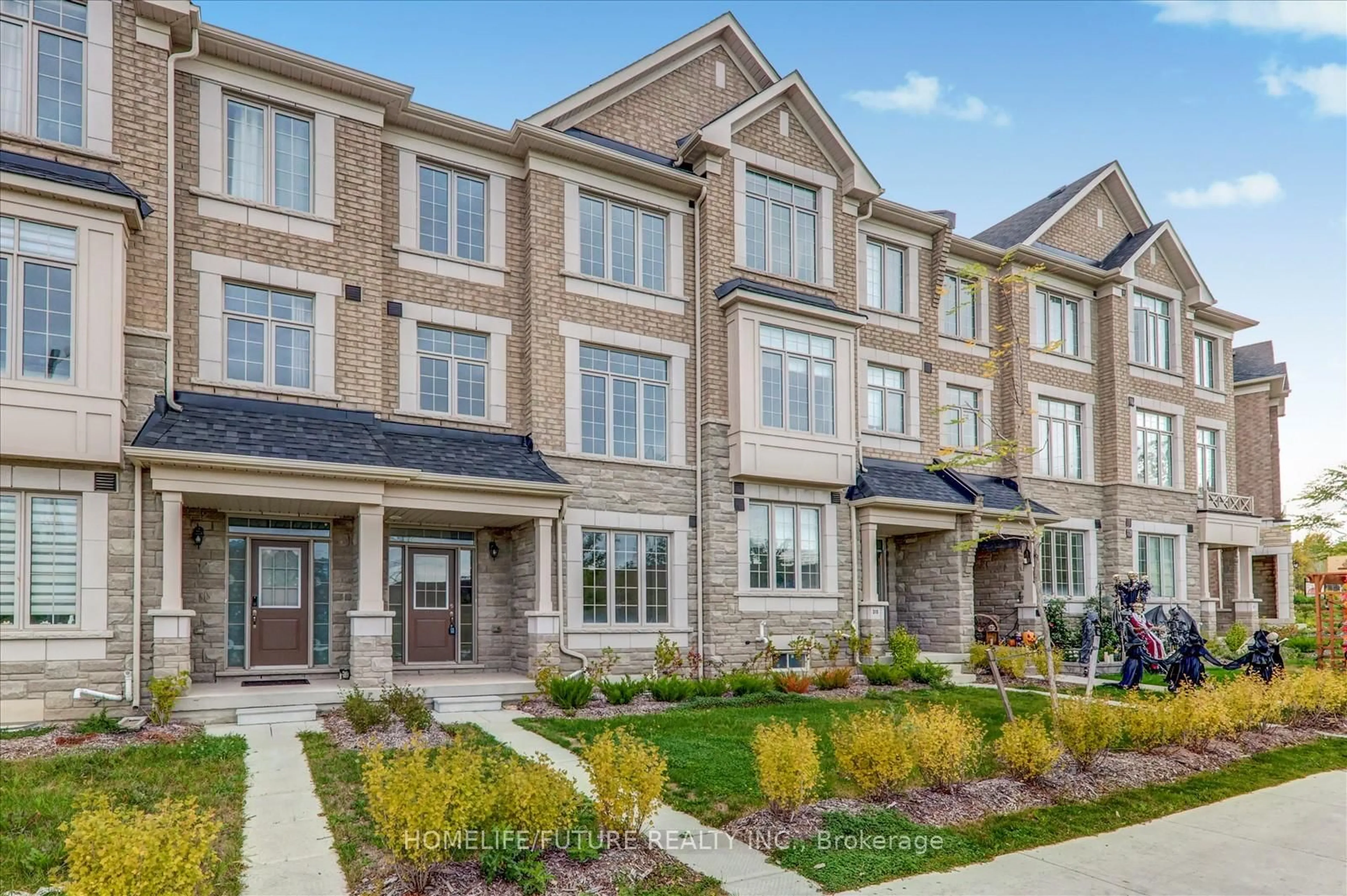 Home with brick exterior material, street for 317 Kirkham Dr, Markham Ontario L3S 0E9