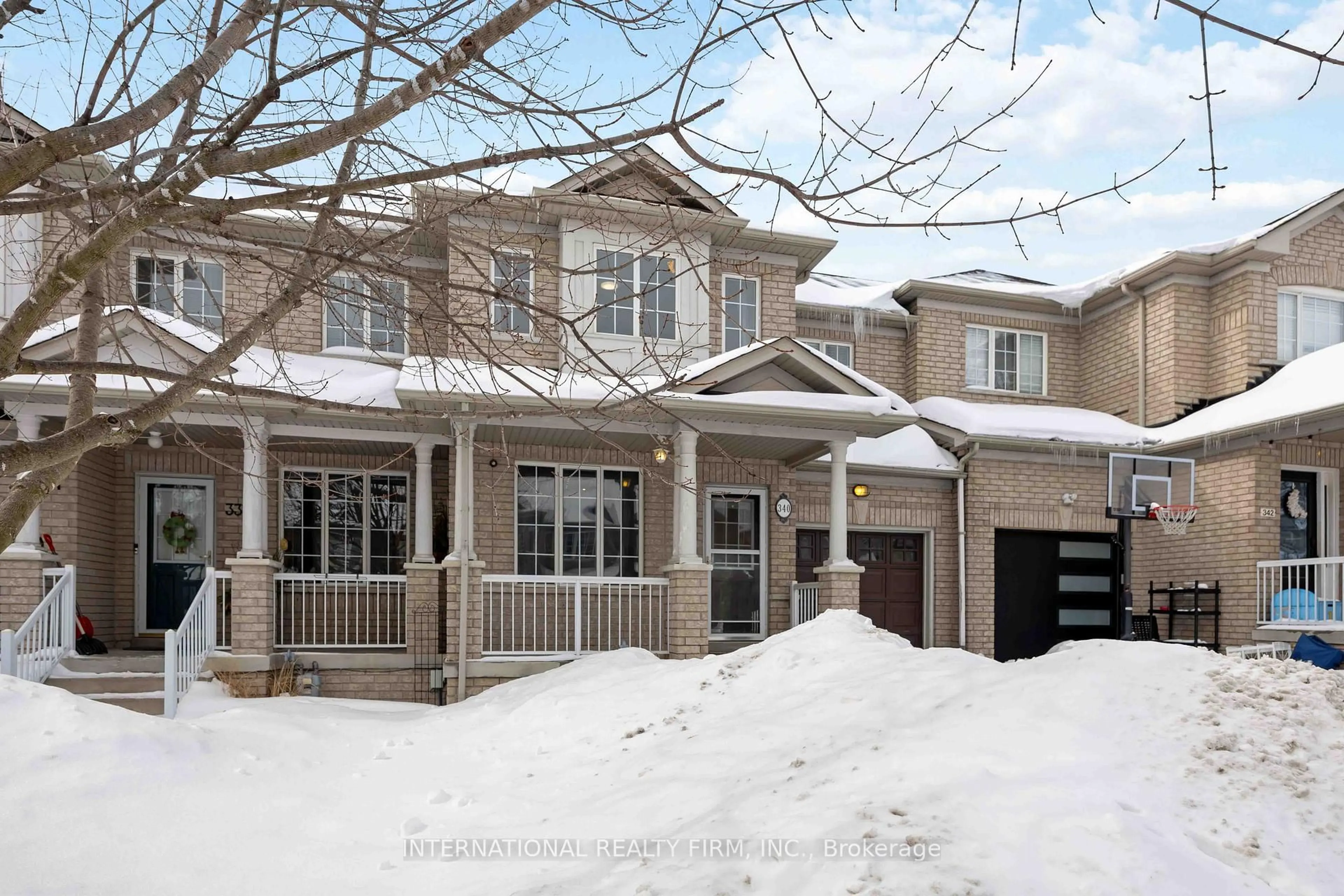 Home with brick exterior material, street for 340 Flagstone Way, Newmarket Ontario L3X 2R8