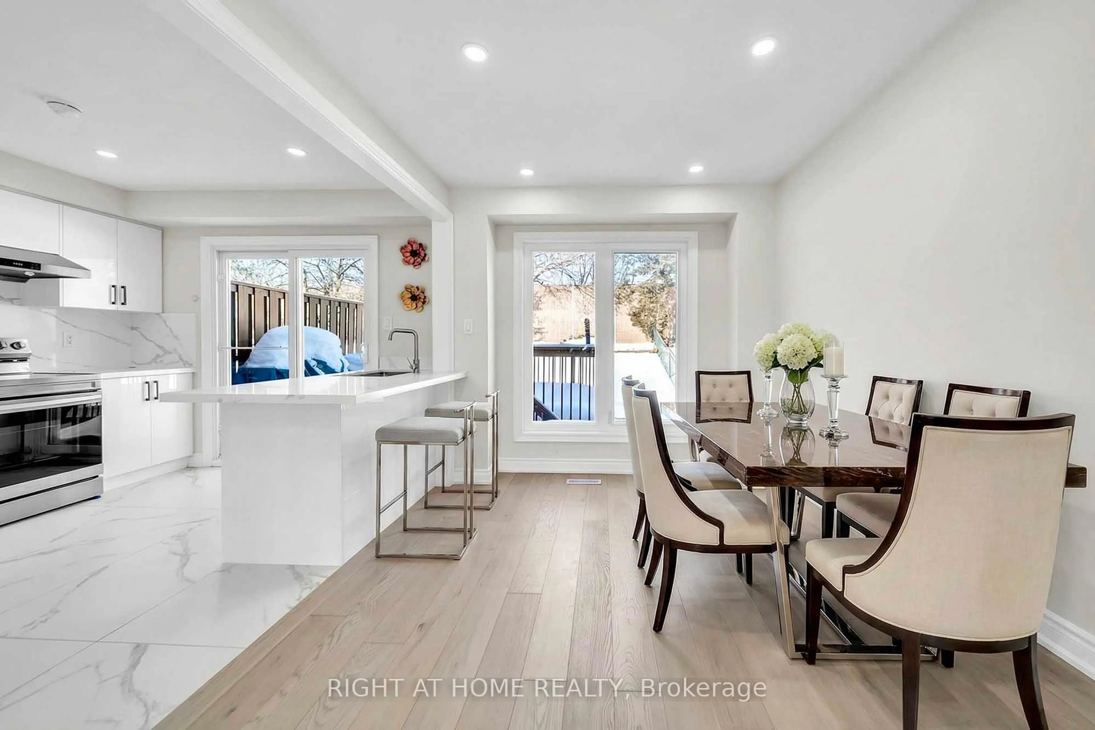 Open concept kitchen, wood/laminate floor for 82 Swinton Cres, Vaughan Ontario L4J 3V5