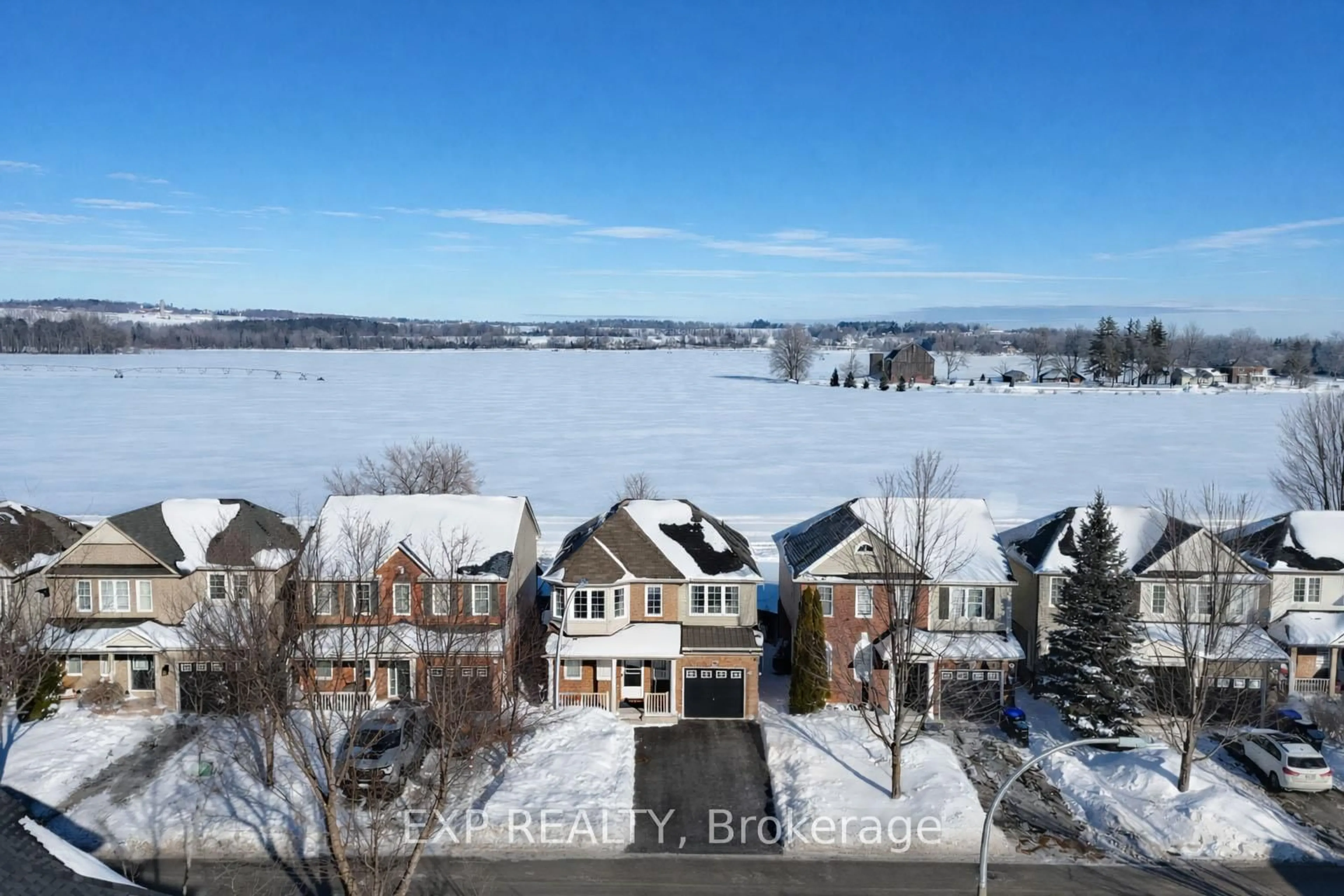 A pic from outside/outdoor area/front of a property/back of a property/a pic from drone, water/lake/river/ocean view for 38 John W Taylor Ave, New Tecumseth Ontario L9R 0B6