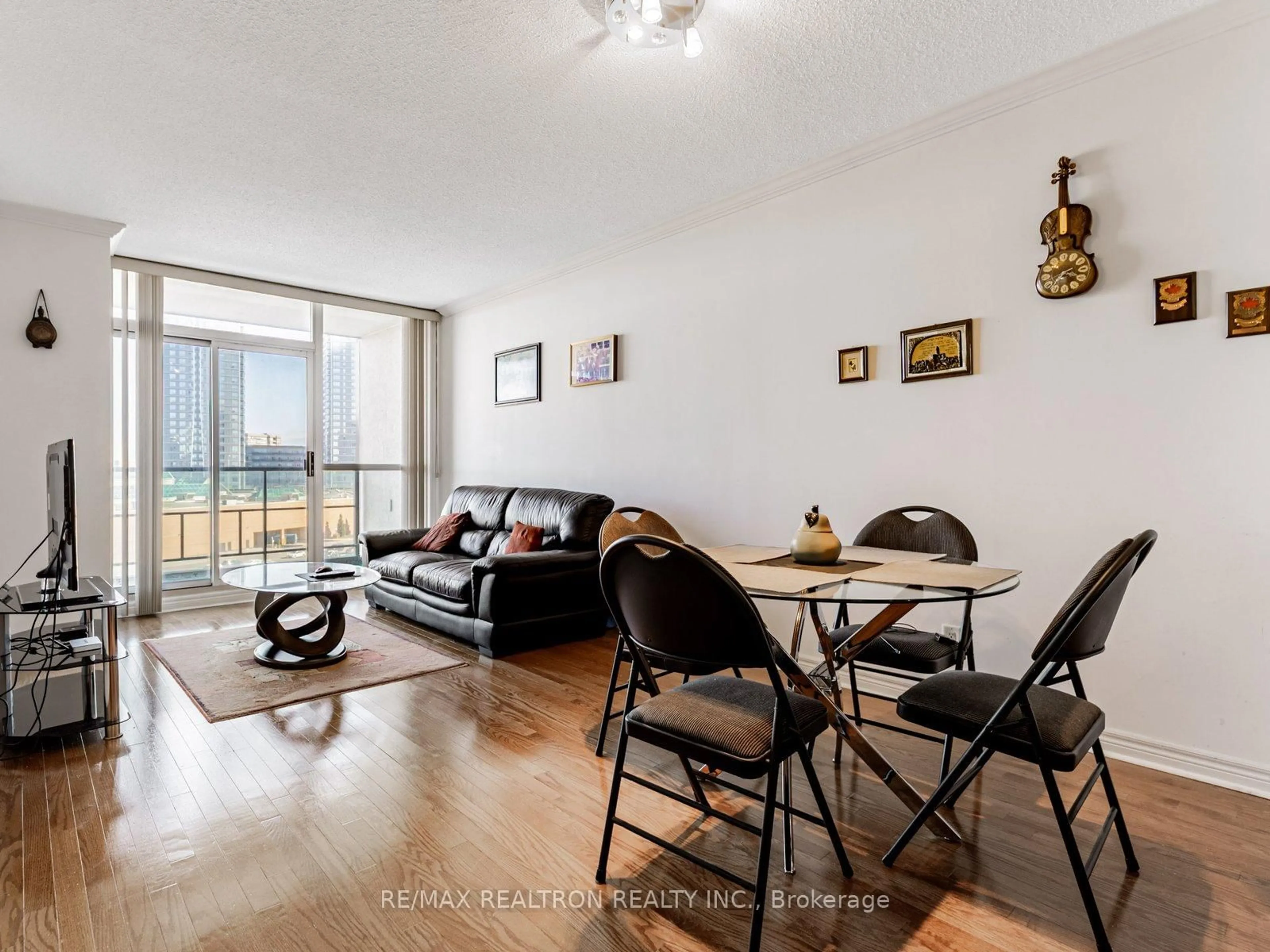 Living room with furniture, wood/laminate floor for 100 Promenade Circ #608, Vaughan Ontario L4J 7W7