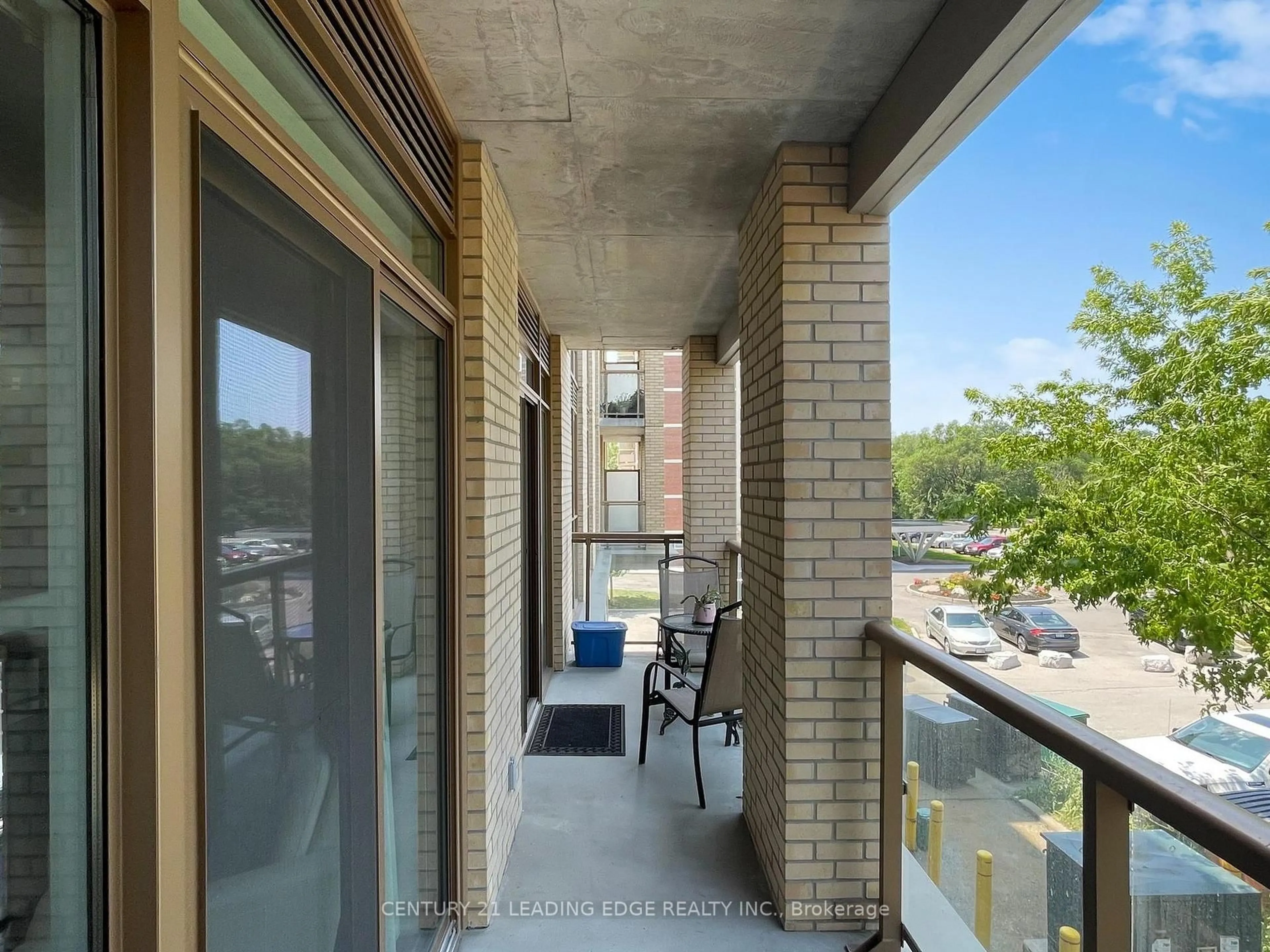 Balcony in the apartment, city buildings view from balcony for 68 Main St #232, Markham Ontario L3P 0N5