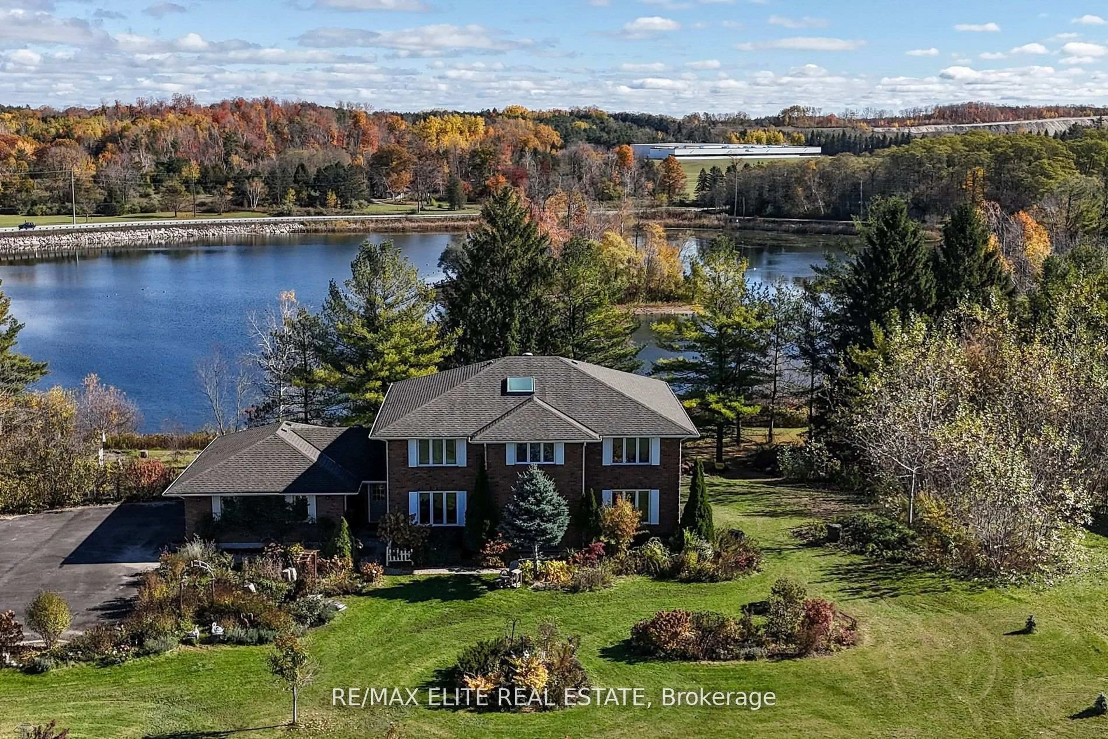 A pic from outside/outdoor area/front of a property/back of a property/a pic from drone, water/lake/river/ocean view for 9 Island Lake Dr, Whitchurch-Stouffville Ontario L4A 7X4