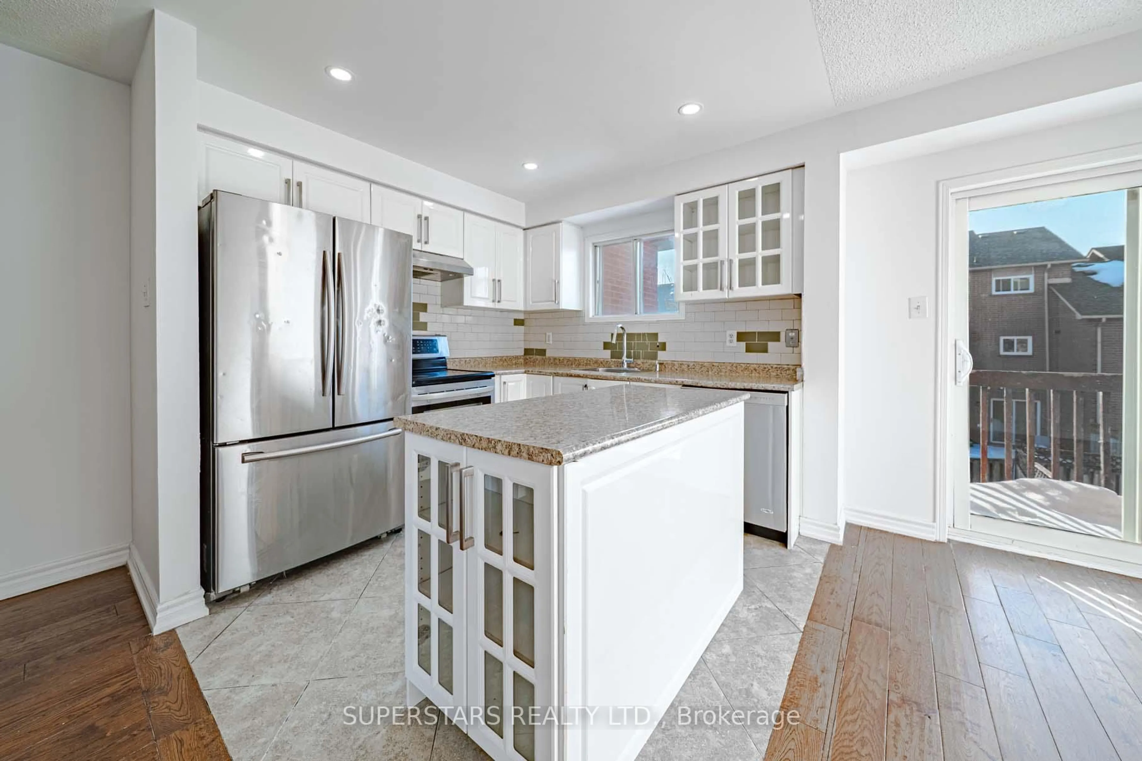 Open concept kitchen, ceramic/tile floor for 99 Roseheath Dr, Vaughan Ontario L6A 2B7