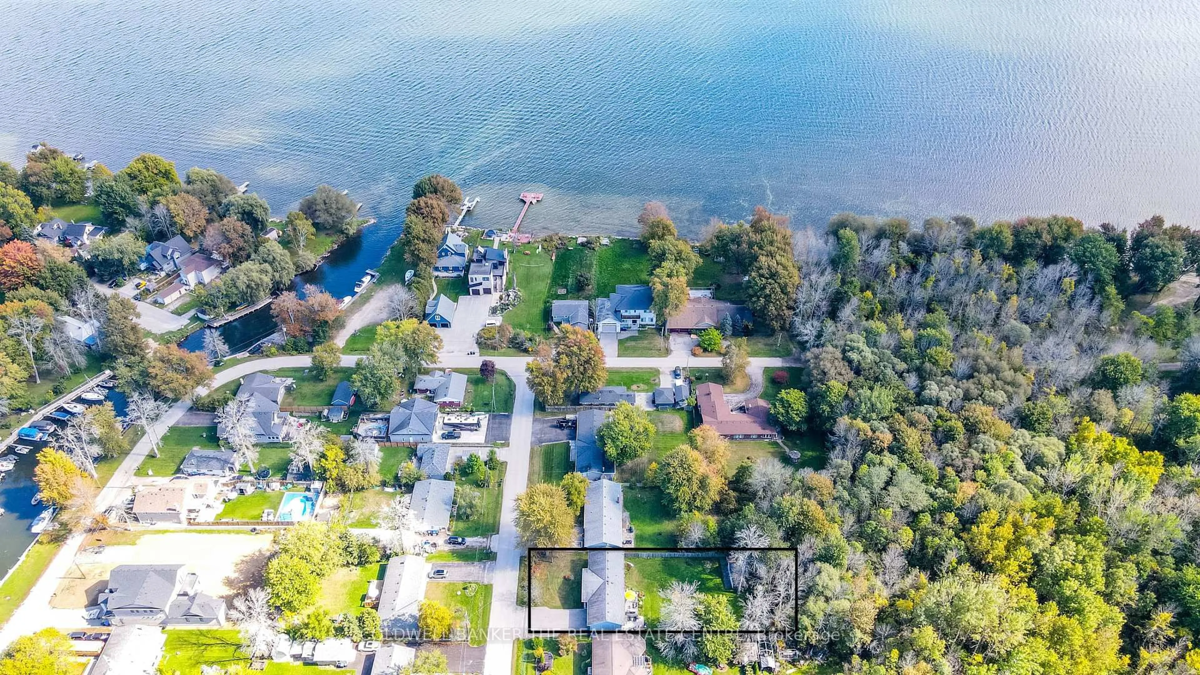 A pic from outside/outdoor area/front of a property/back of a property/a pic from drone, water/lake/river/ocean view for 1151 Birch Rd, Innisfil Ontario L0L 1R0