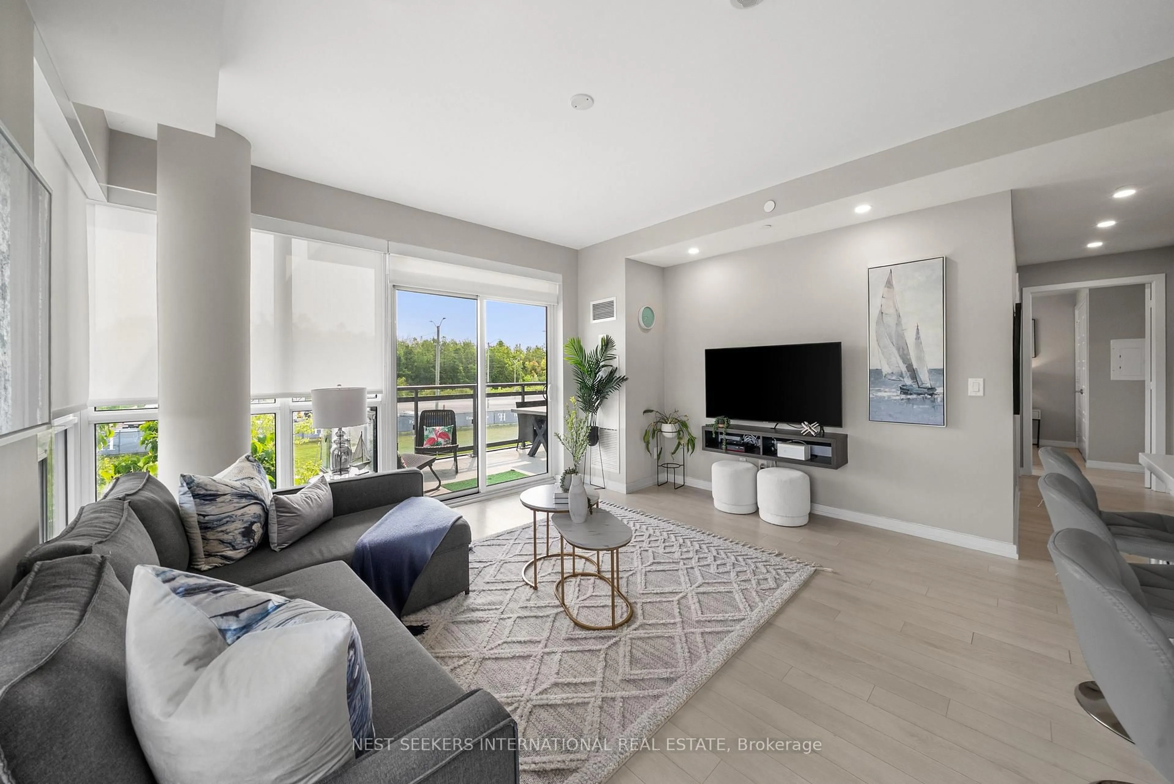 Living room with furniture, unknown for 241 Sea Ray Ave #A213, Innisfil Ontario L9S 2P7