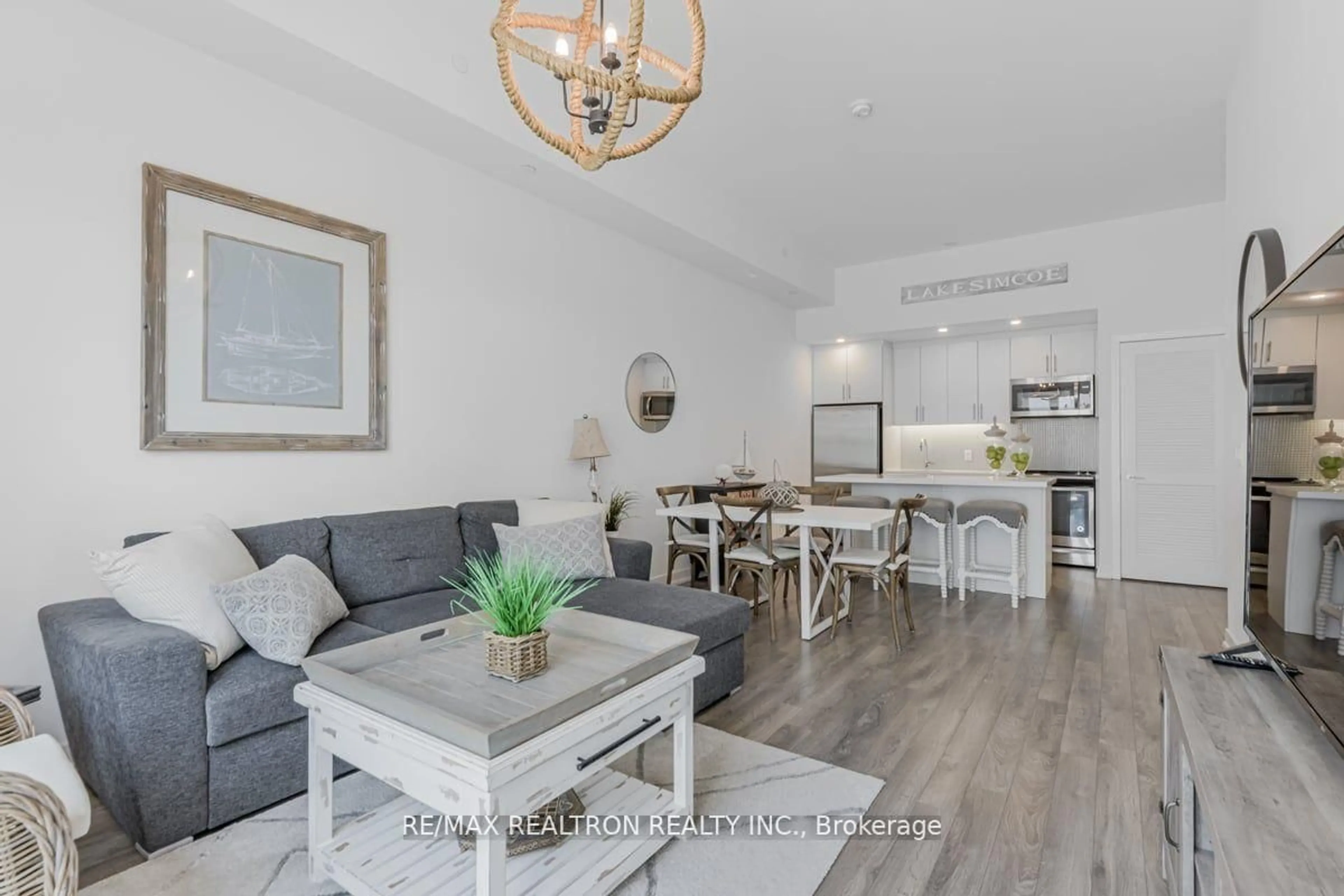 Open concept kitchen, wood/laminate floor for 247 Broward Way #34, Innisfil Ontario L9S 0M2