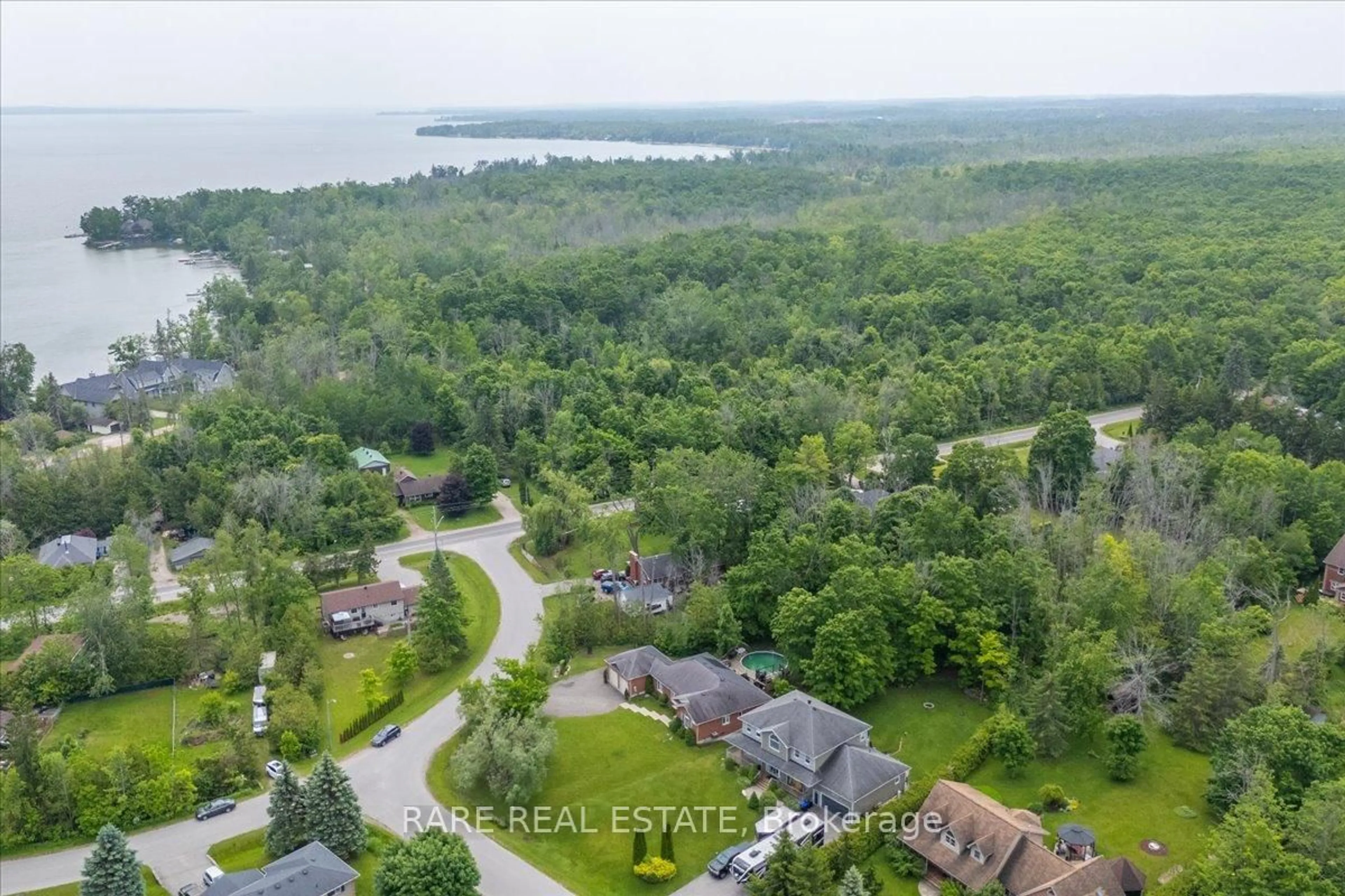 A pic from outside/outdoor area/front of a property/back of a property/a pic from drone, water/lake/river/ocean view for 3618 Linda St, Innisfil Ontario L9S 2L2