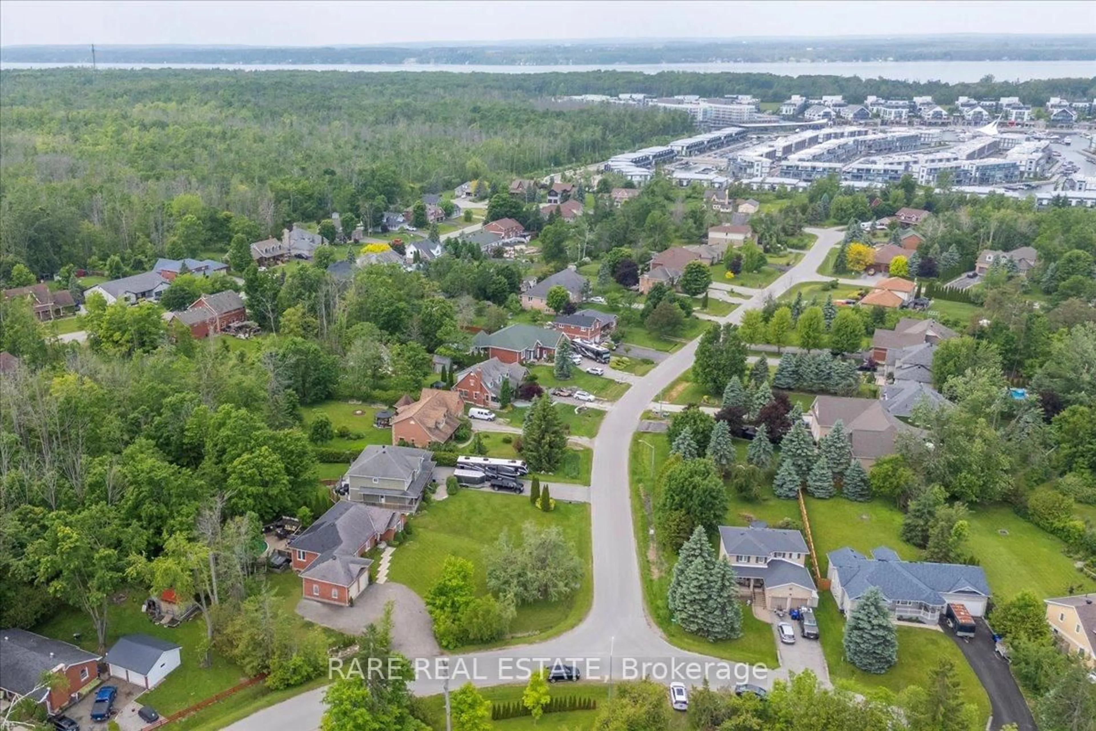 A pic from outside/outdoor area/front of a property/back of a property/a pic from drone, water/lake/river/ocean view for 3618 Linda St, Innisfil Ontario L9S 2L2